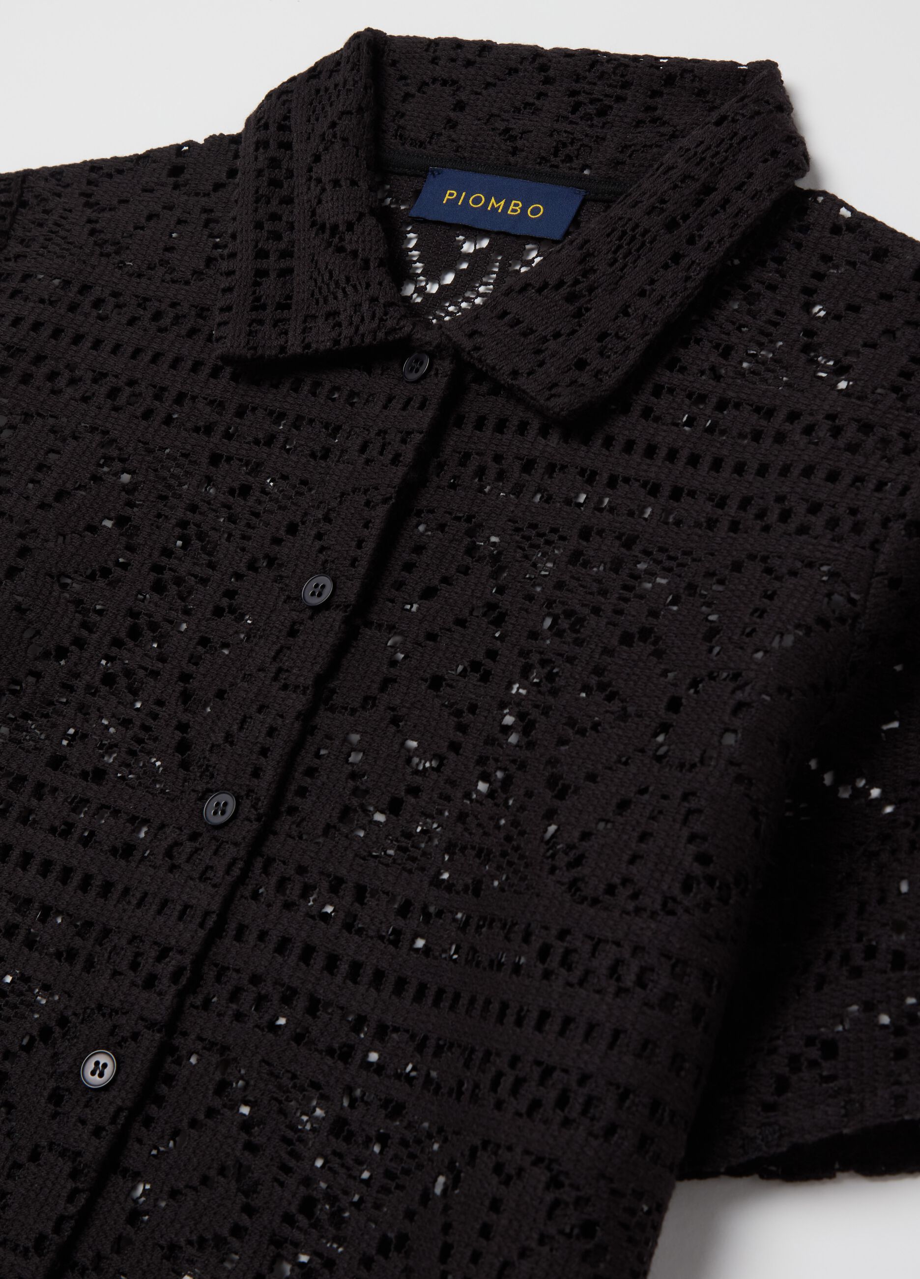 Black polo shirt in lace