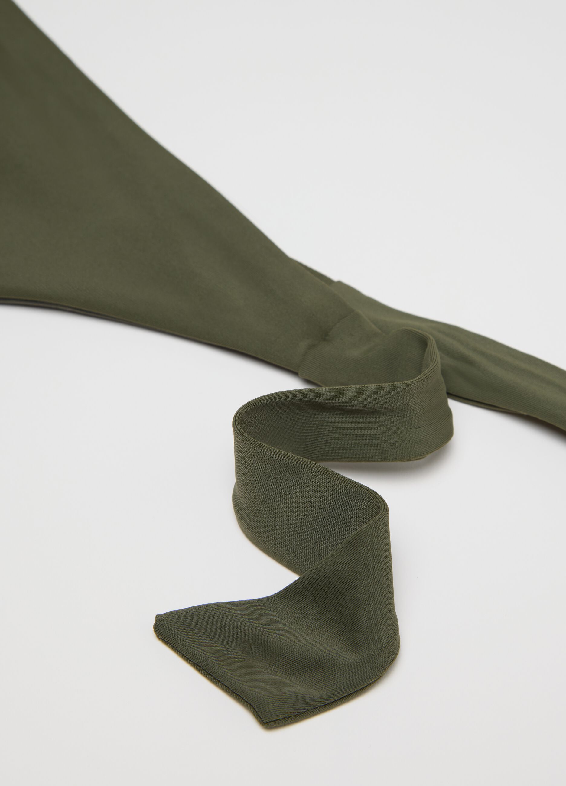 Slip bikini verde con laccetti laterali