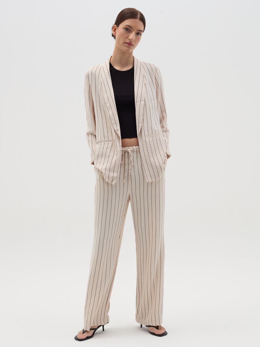 Crinkle-effect fluid trousers_0