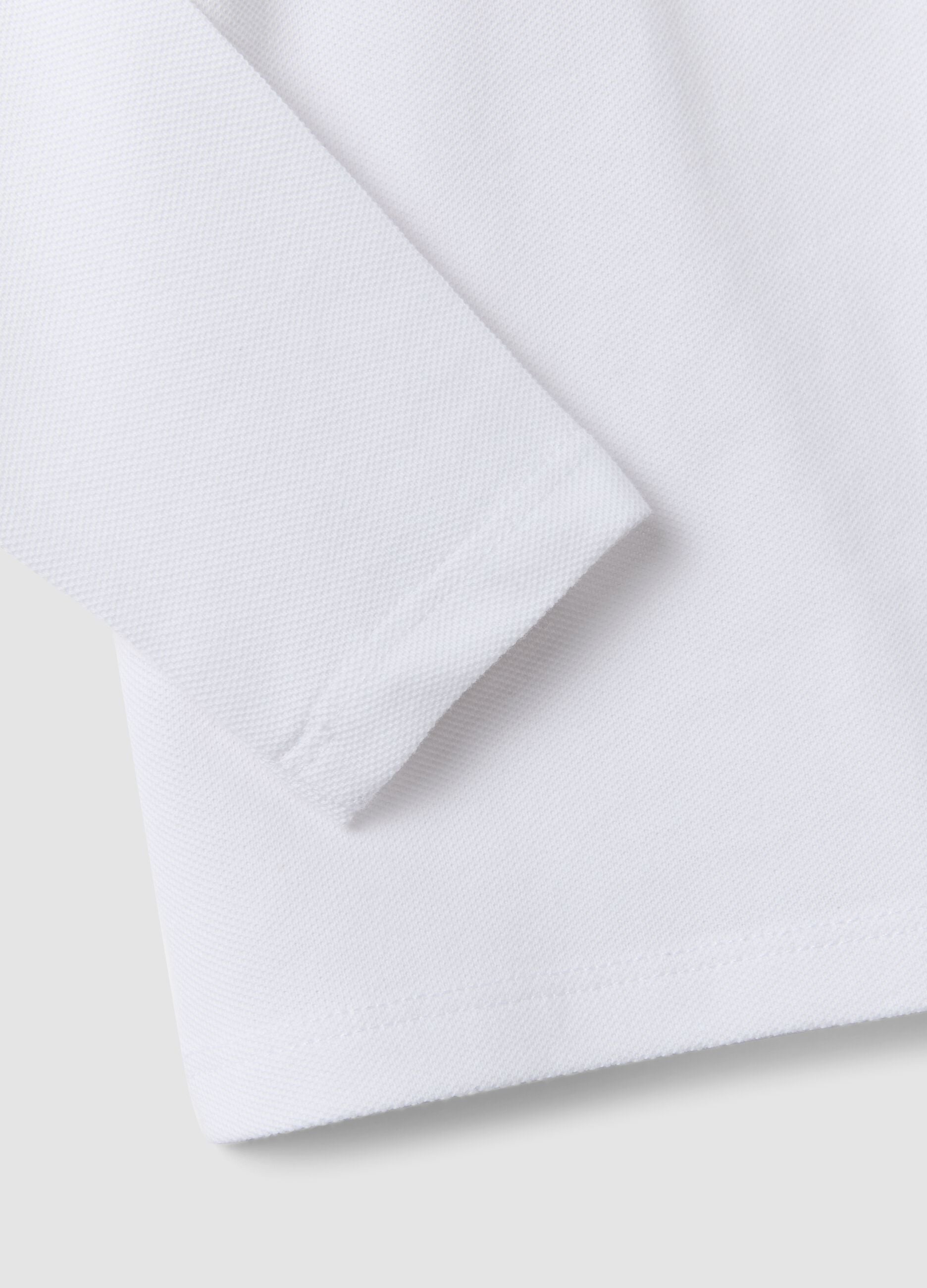 White long-sleeve organic cotton polo