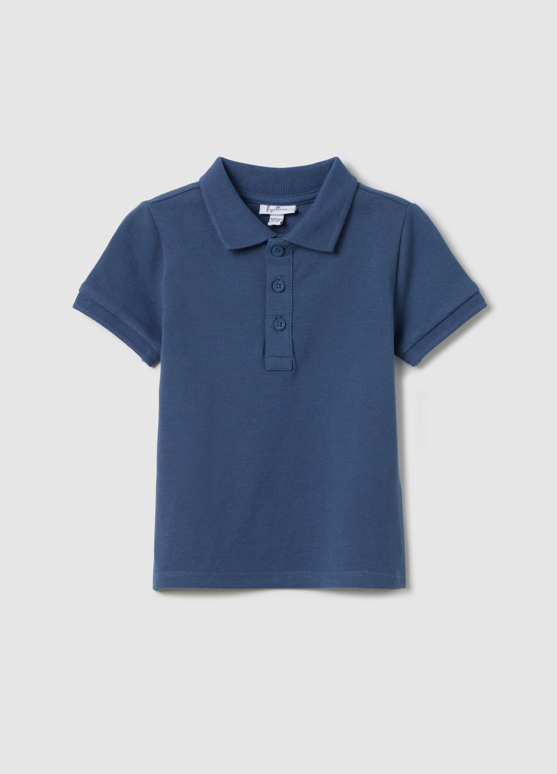 Blue short-sleeved polo shirt in piquet