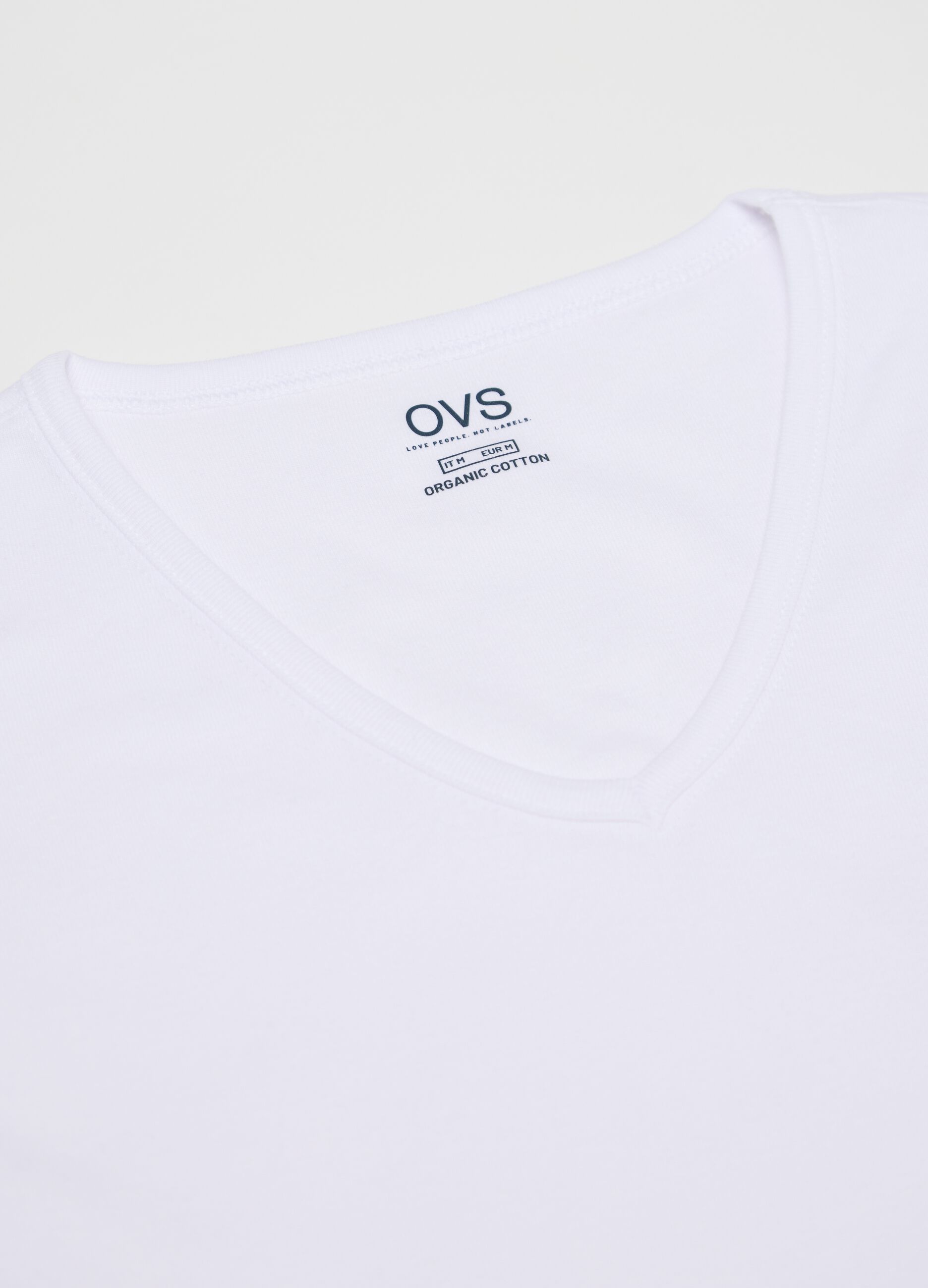 White vest in cotton with V neck