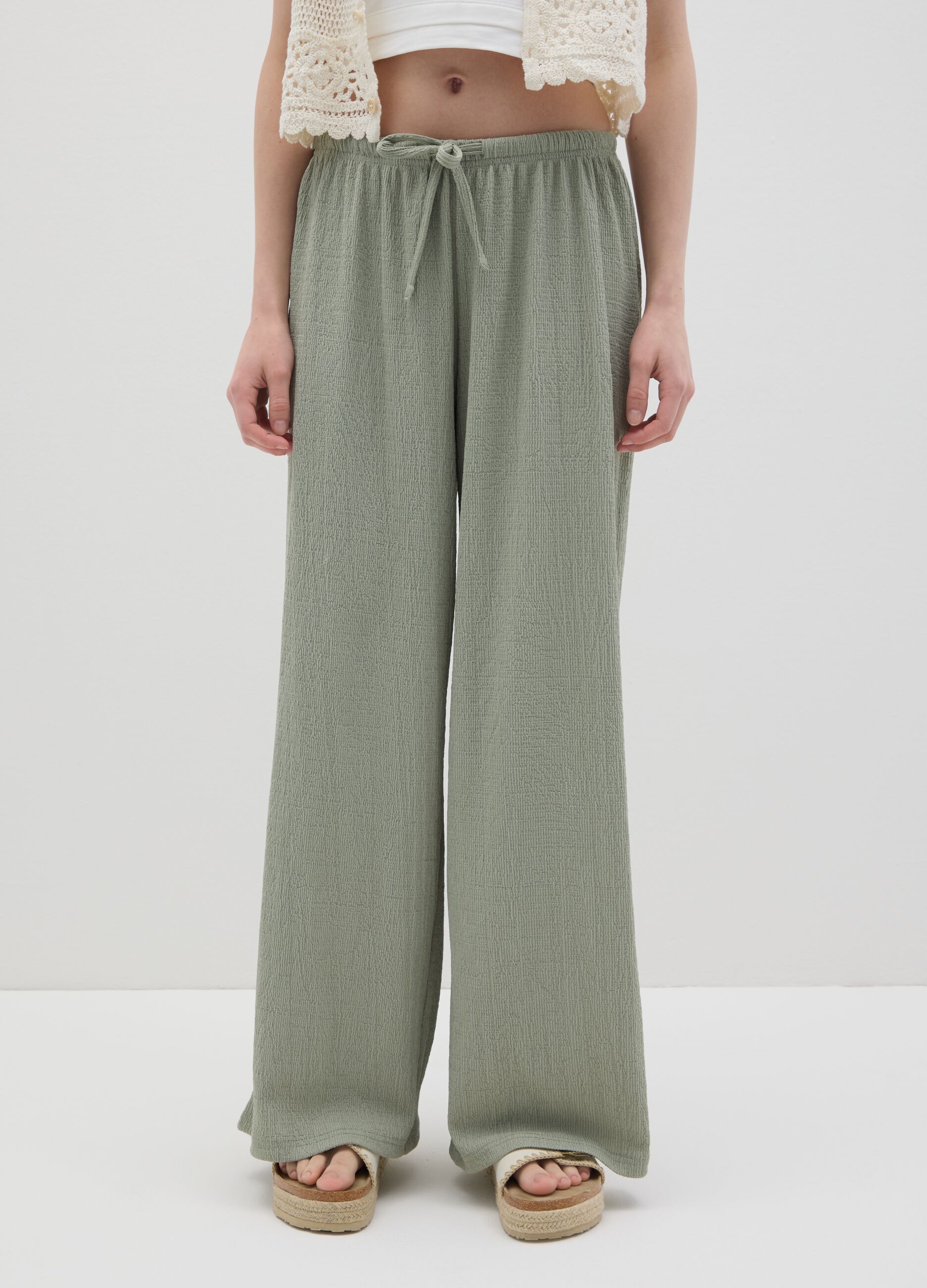 Women’s palazzo pants in green stretch fabric