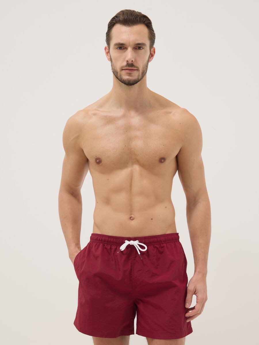 Red regular-fit swim shorts with drawstring_0