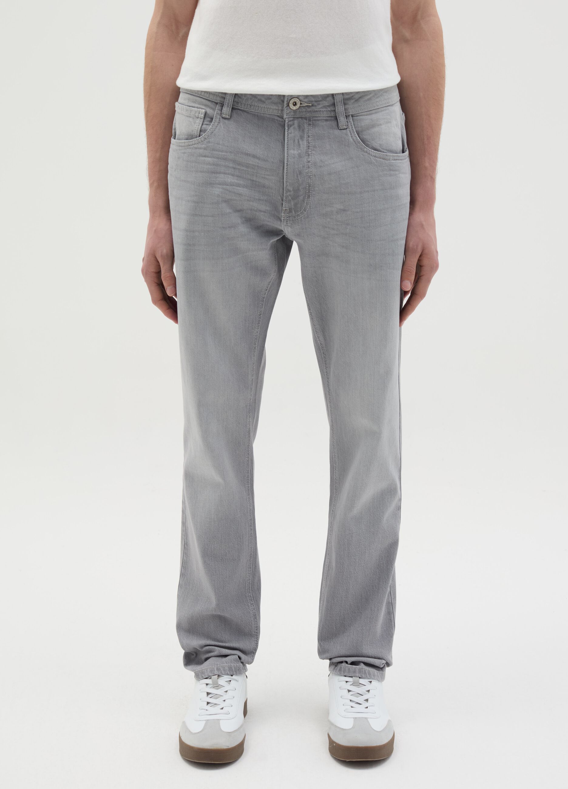 Jeans slim fit con scoloriture