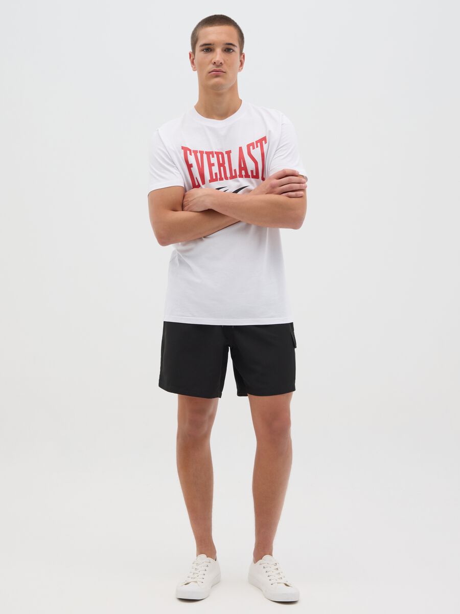 Black swimming trunks with logo print_0