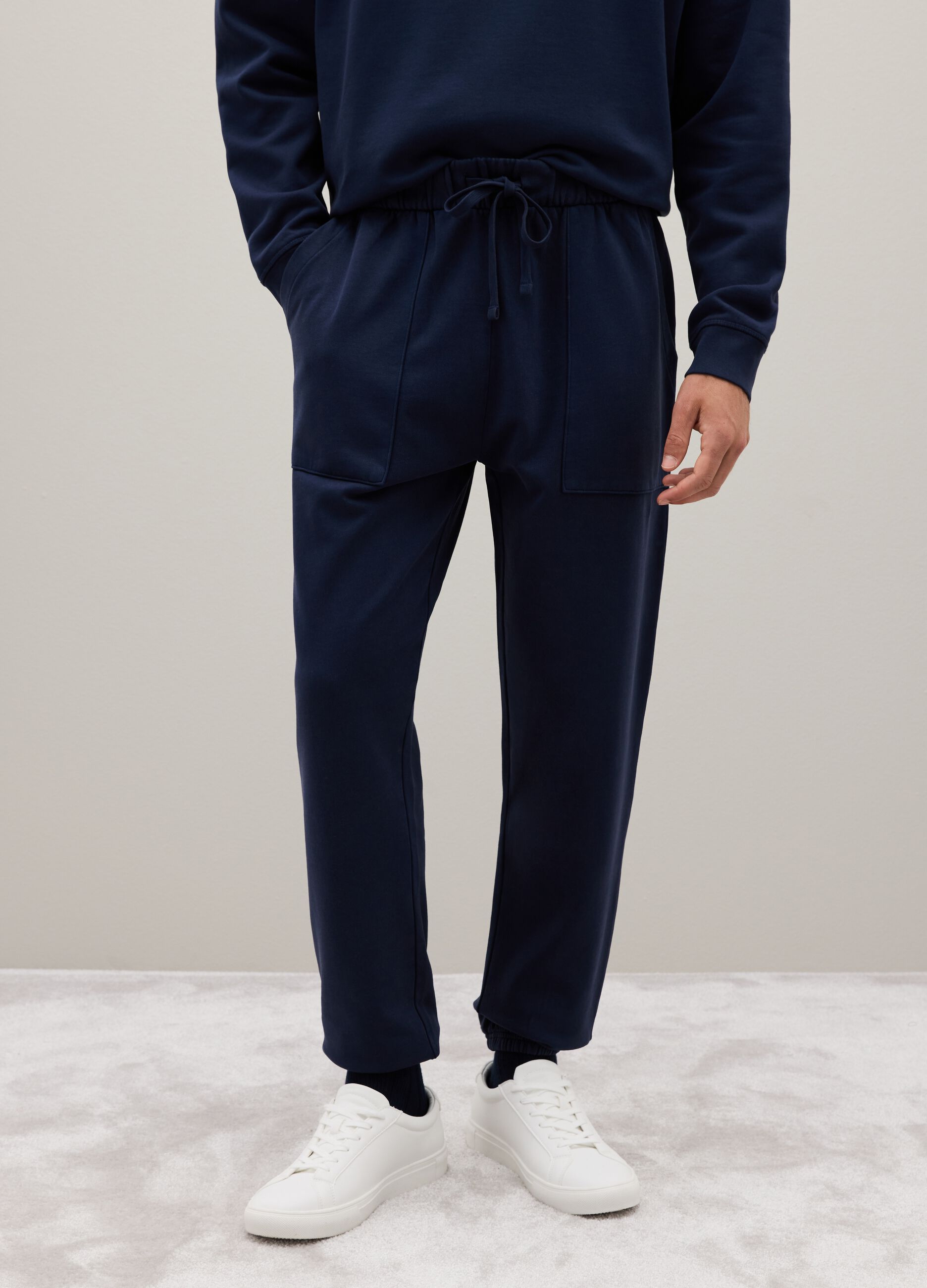 Blue cotton trousers with elastic waistband