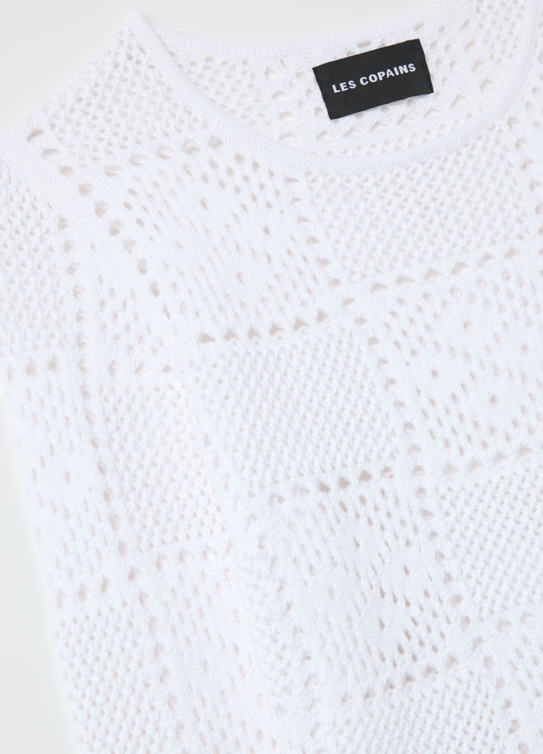 Maglia traforata bianca a maniche lunghe