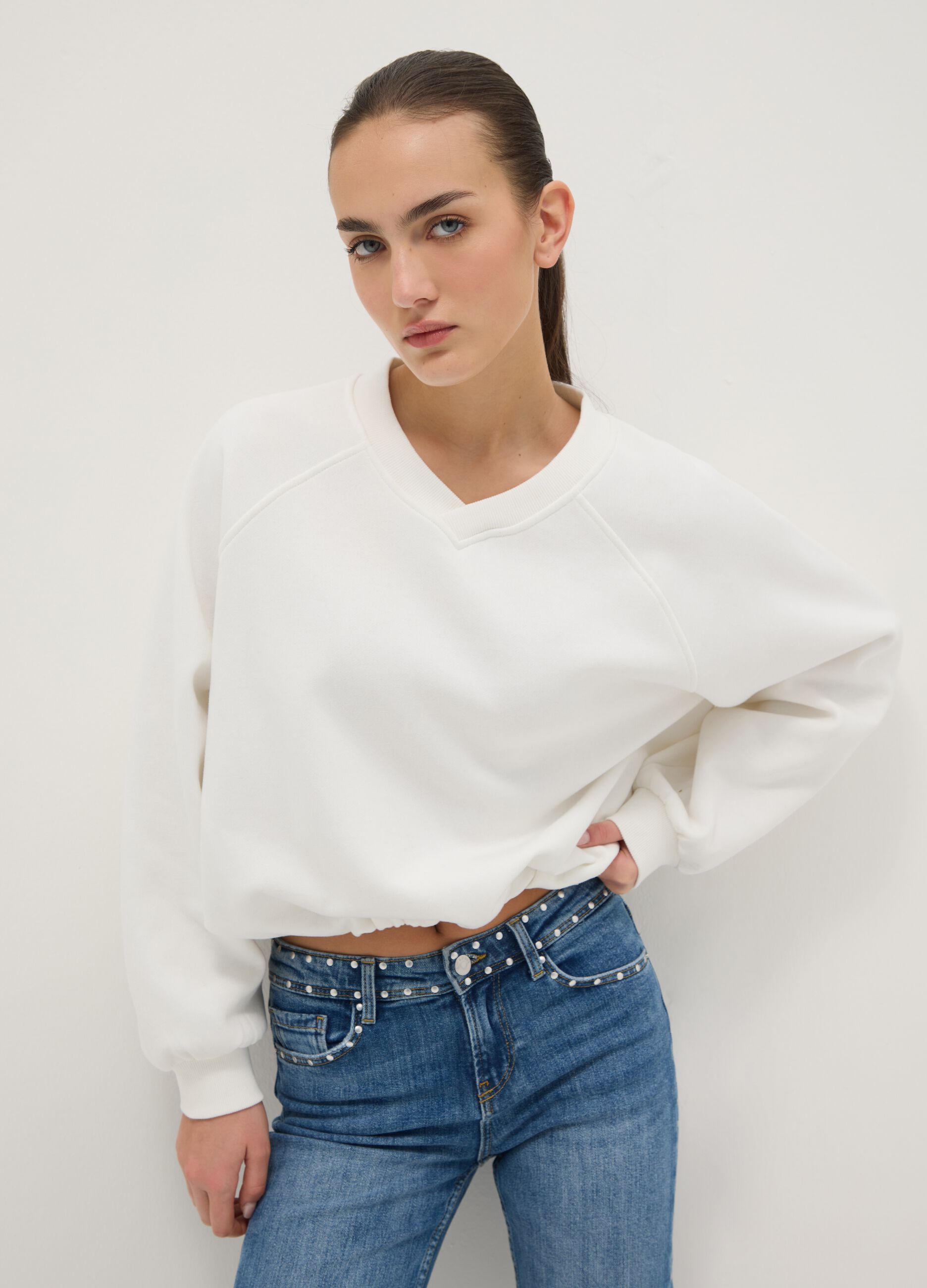Oversized white cotton blend sweatshirt with V-neck