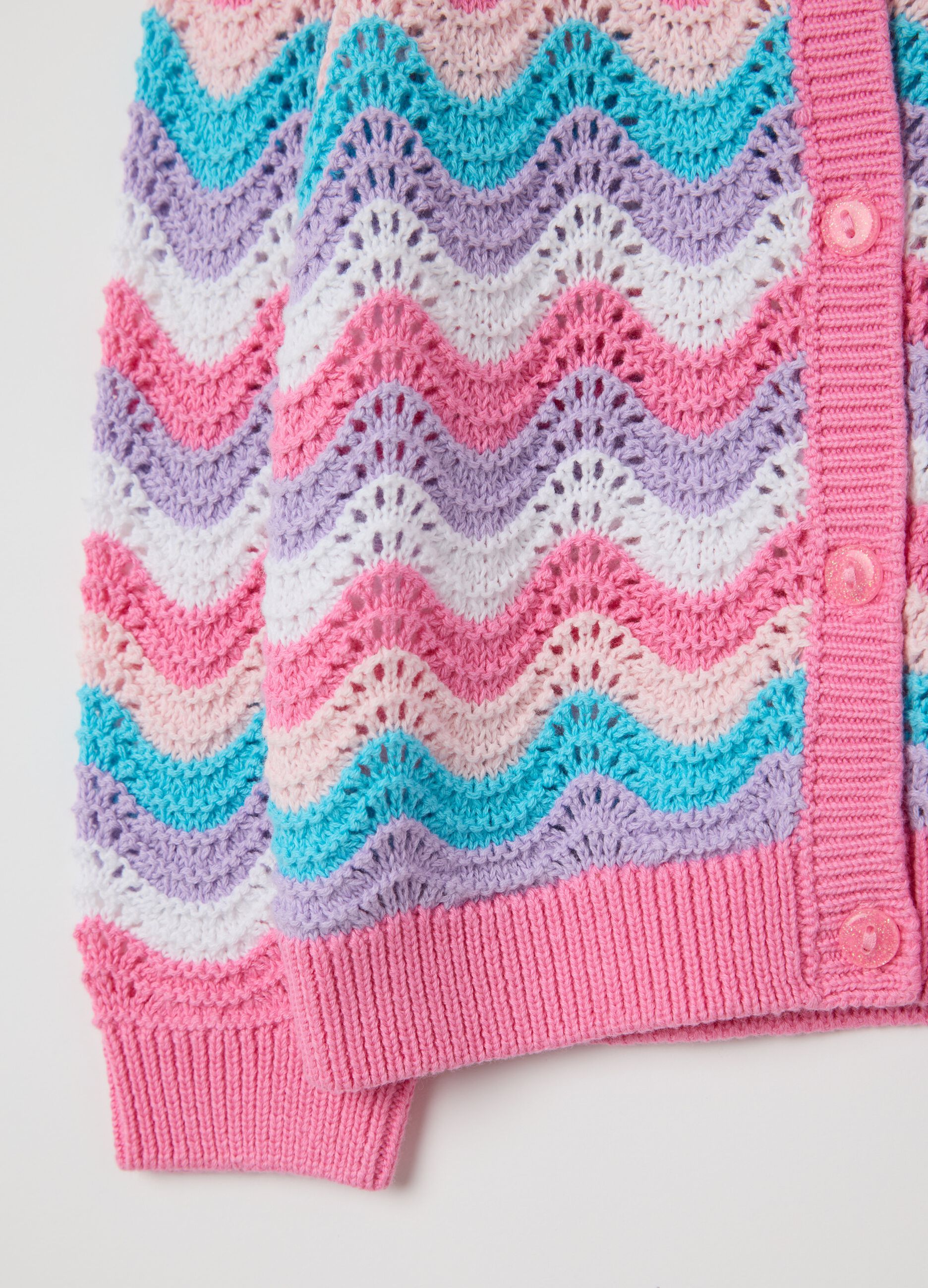 Pink and light blue cardigan with striped openwork design