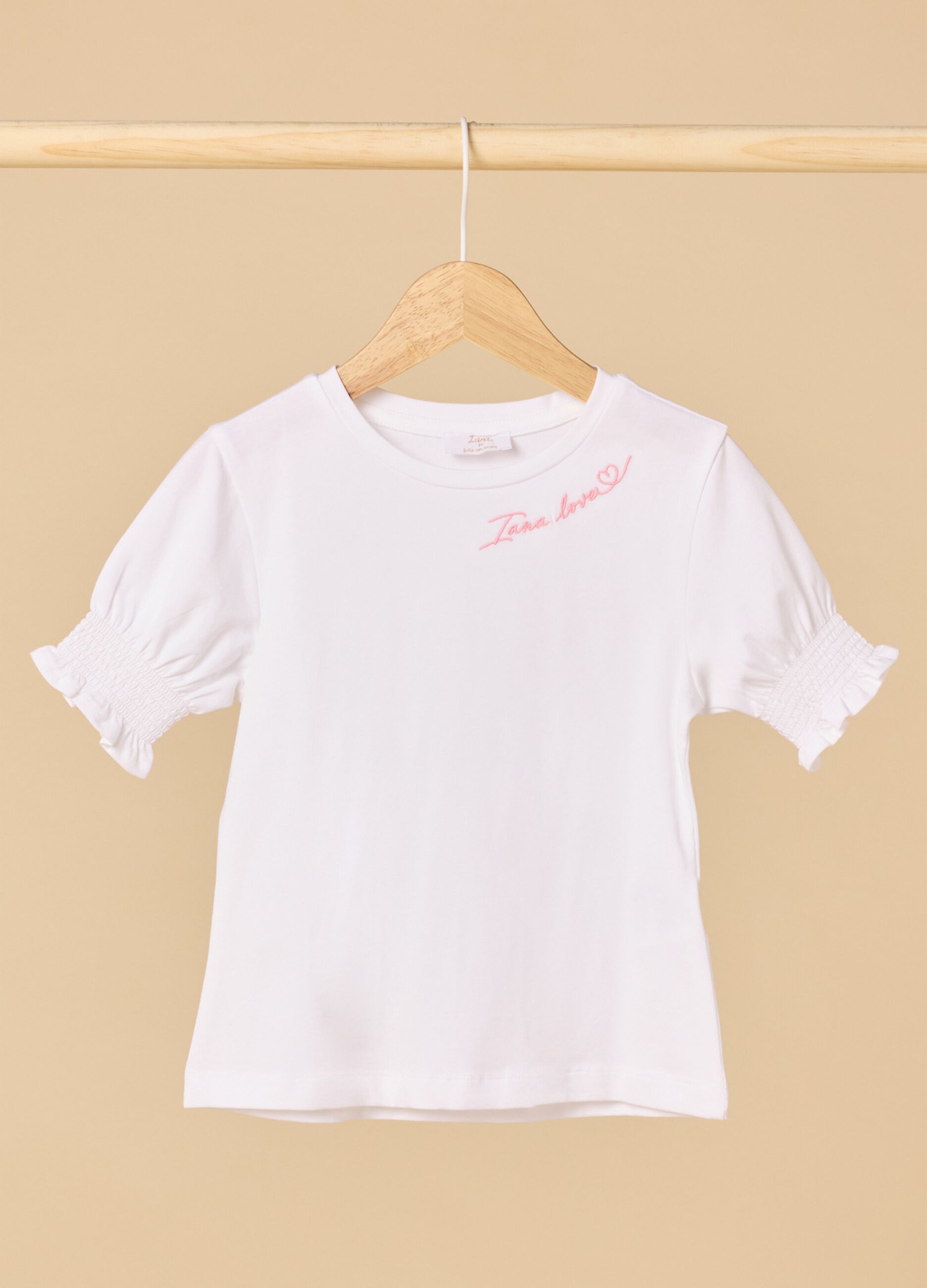 Stretch cotton t-shirt with embroideries and smock.