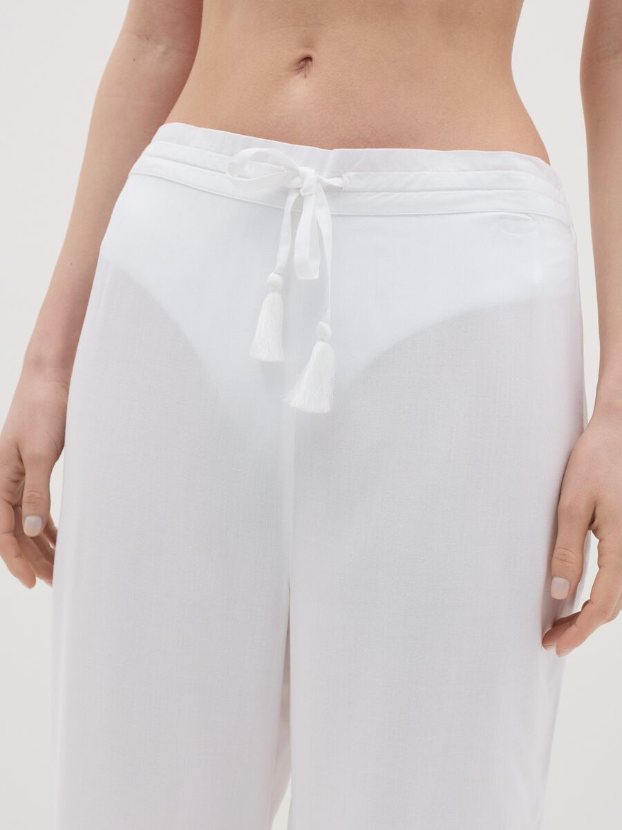 Long white beach cover-up trousers with drawstring_2