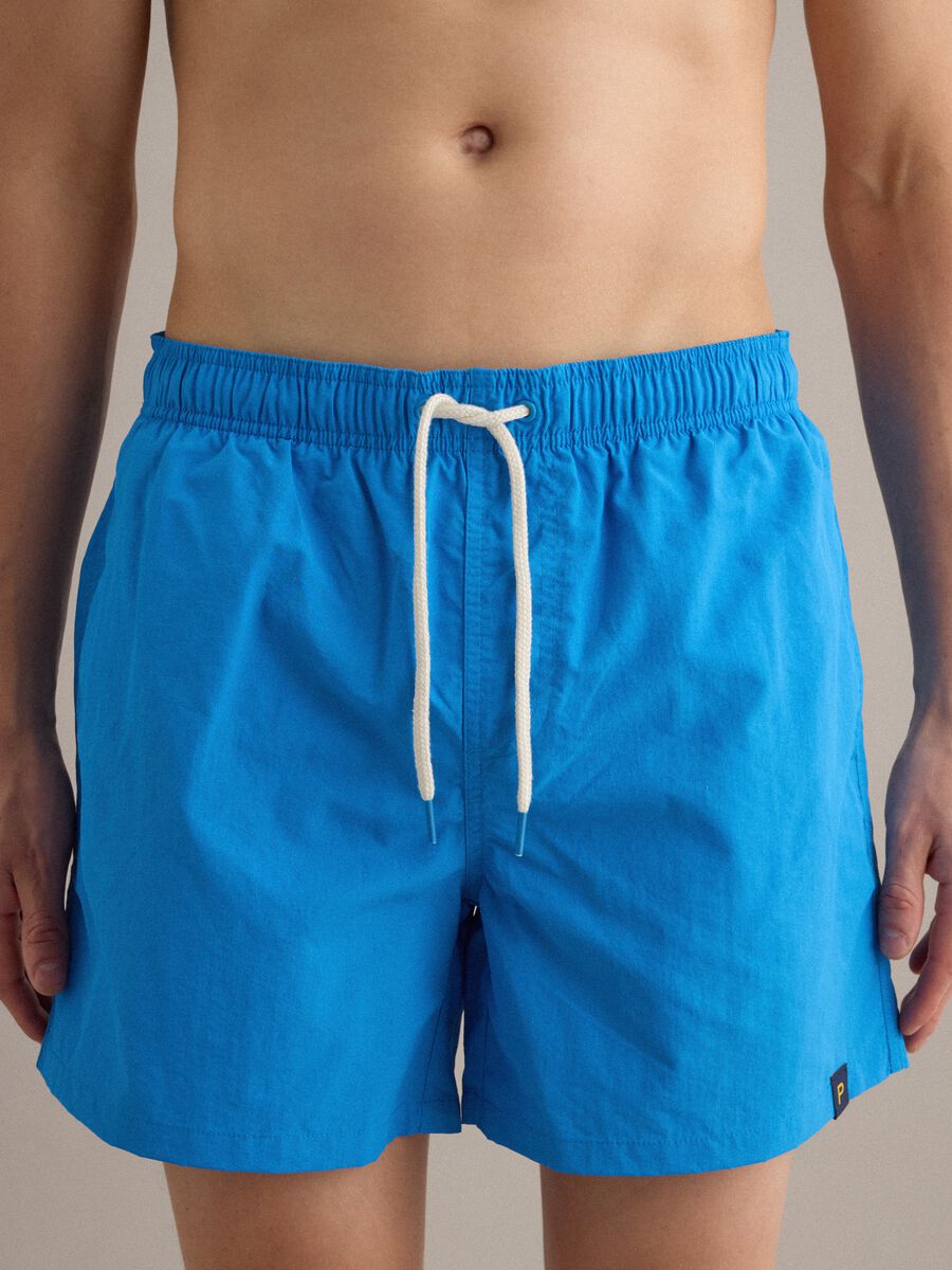 Boxer da mare azzurri con vita elasticizzata e coulisse_2
