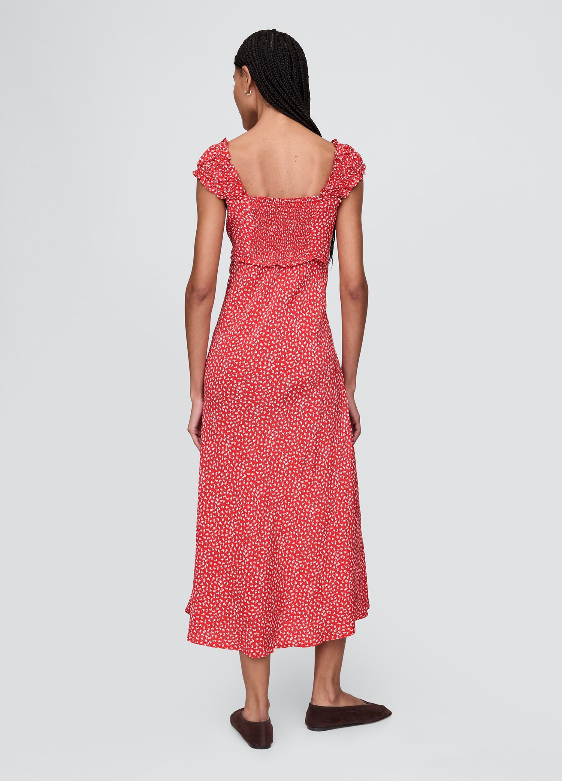 Sleeveless dress with floral pattern
