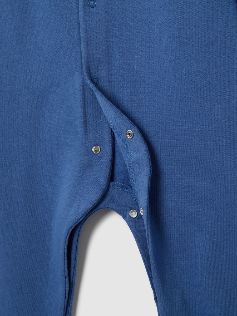 Blue cotton jumpsuit with dinosaur print_3