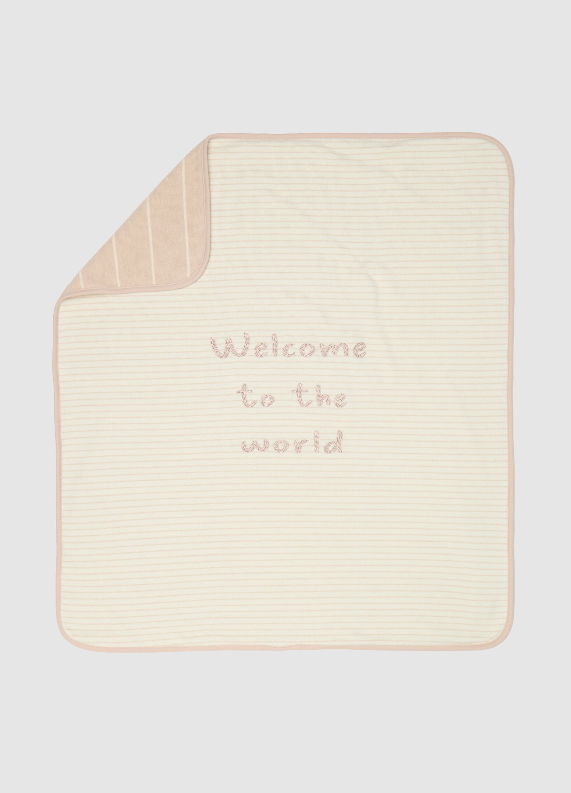 Blanket with "Welcome To The World" embroidery