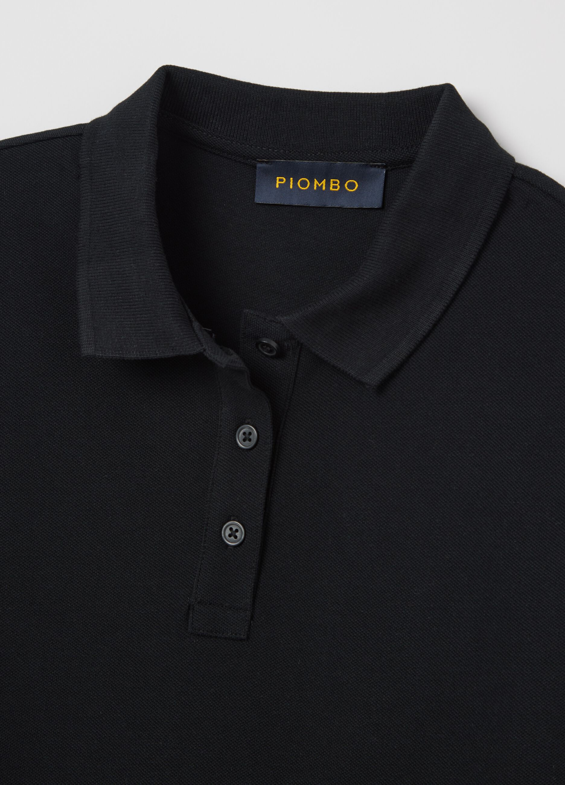 Polo a maniche corte in piquet nero