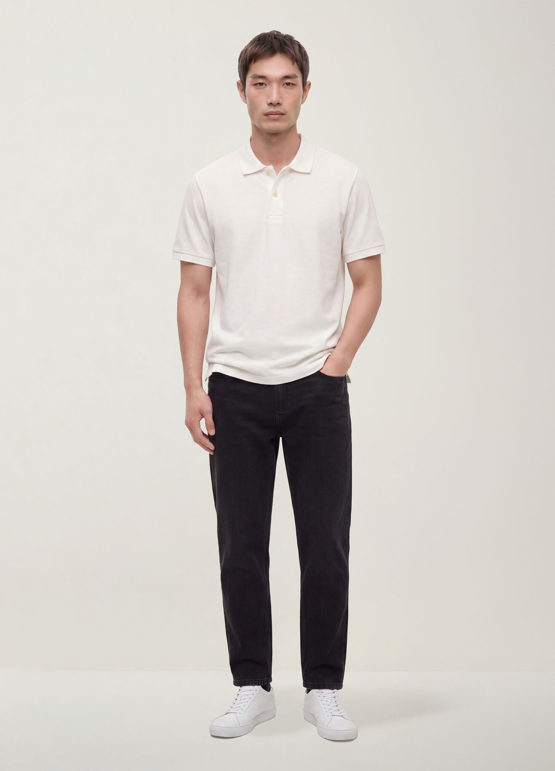 Black regular tapered jeans in a cotton, lyocell and viscose blend