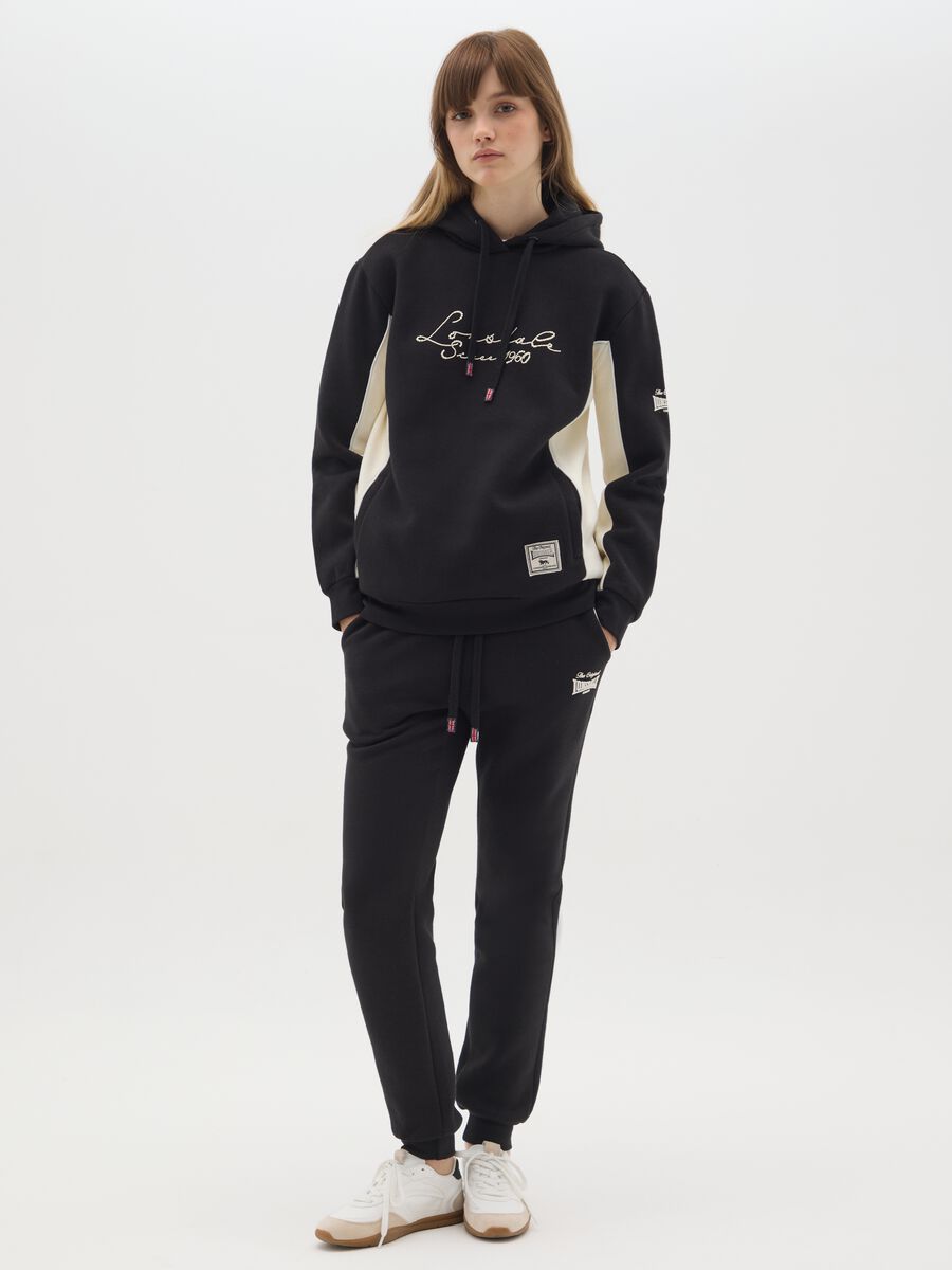 Black regular fit cotton blend trousers_0