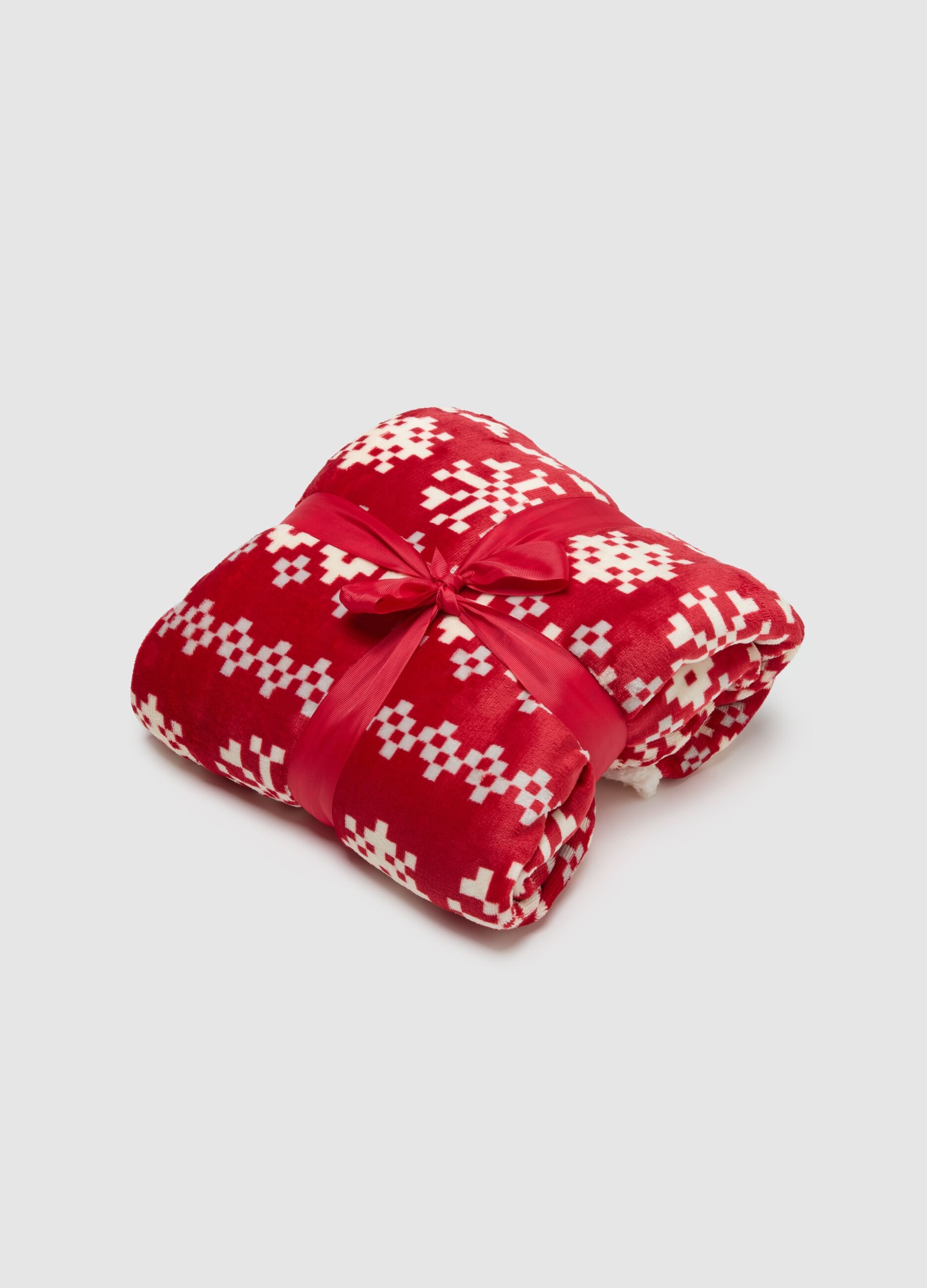 Red blanket with Christmas motif