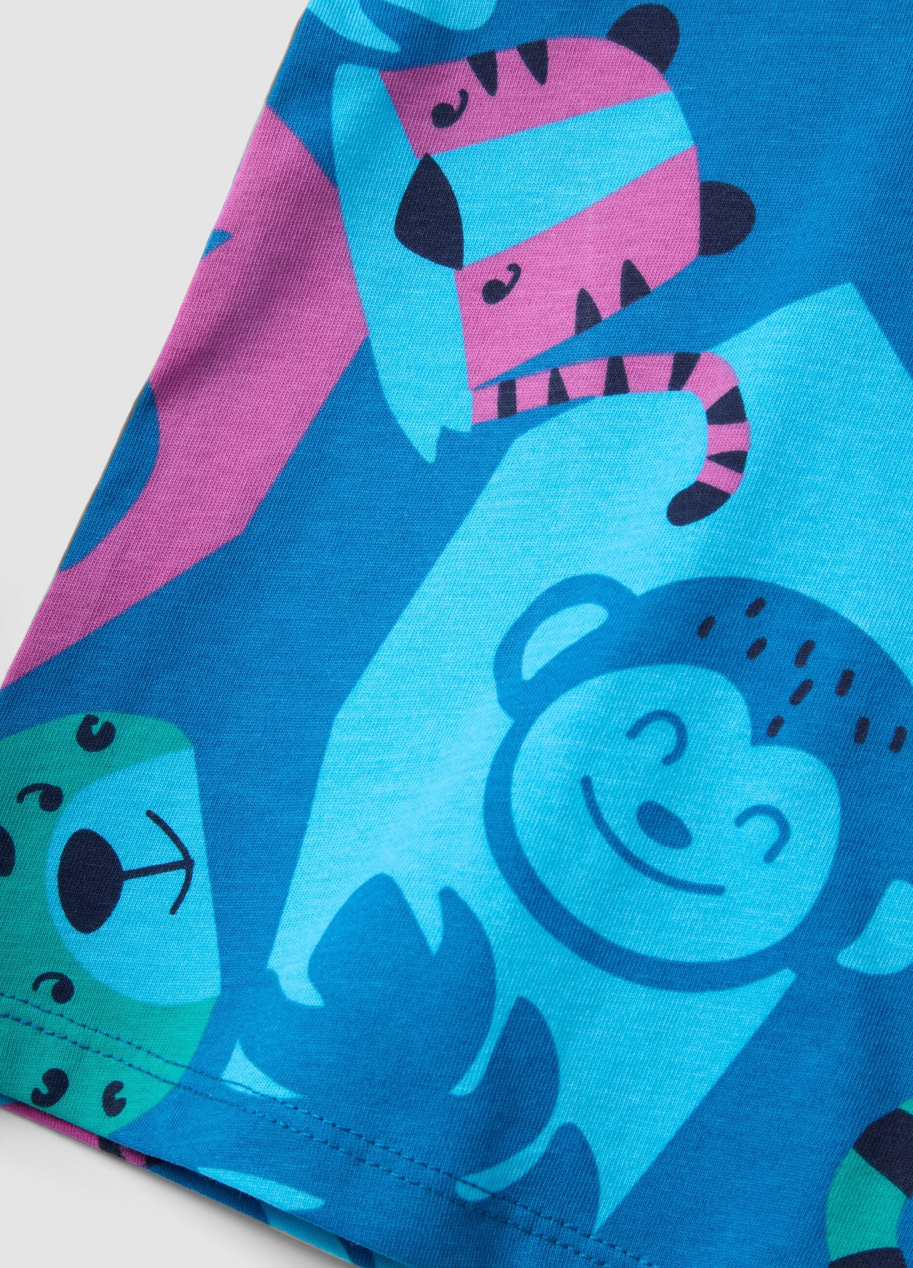 Blue organic cotton tank top with tropical print