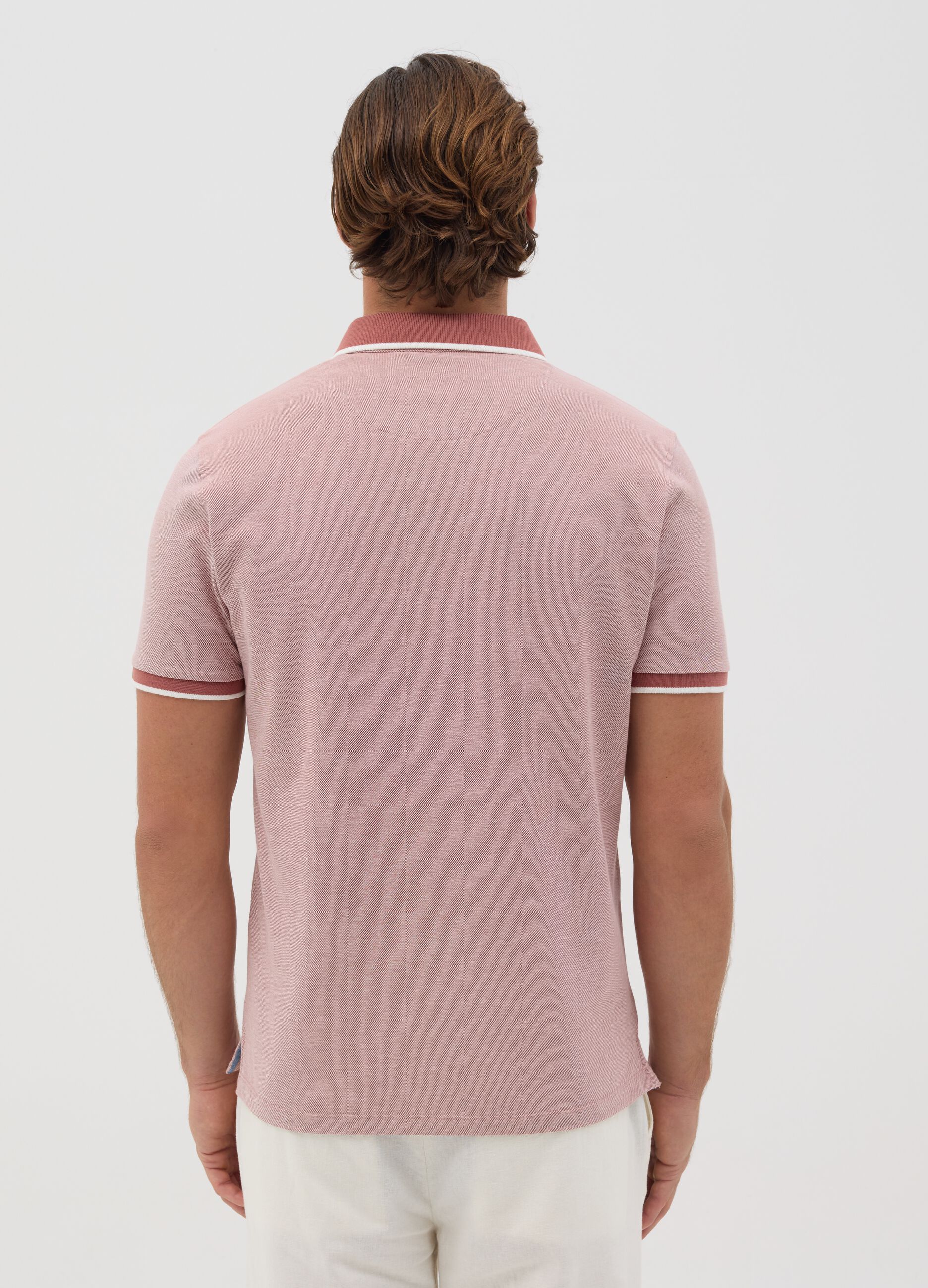 Pink polo shirt with short sleeves in cotton piquet