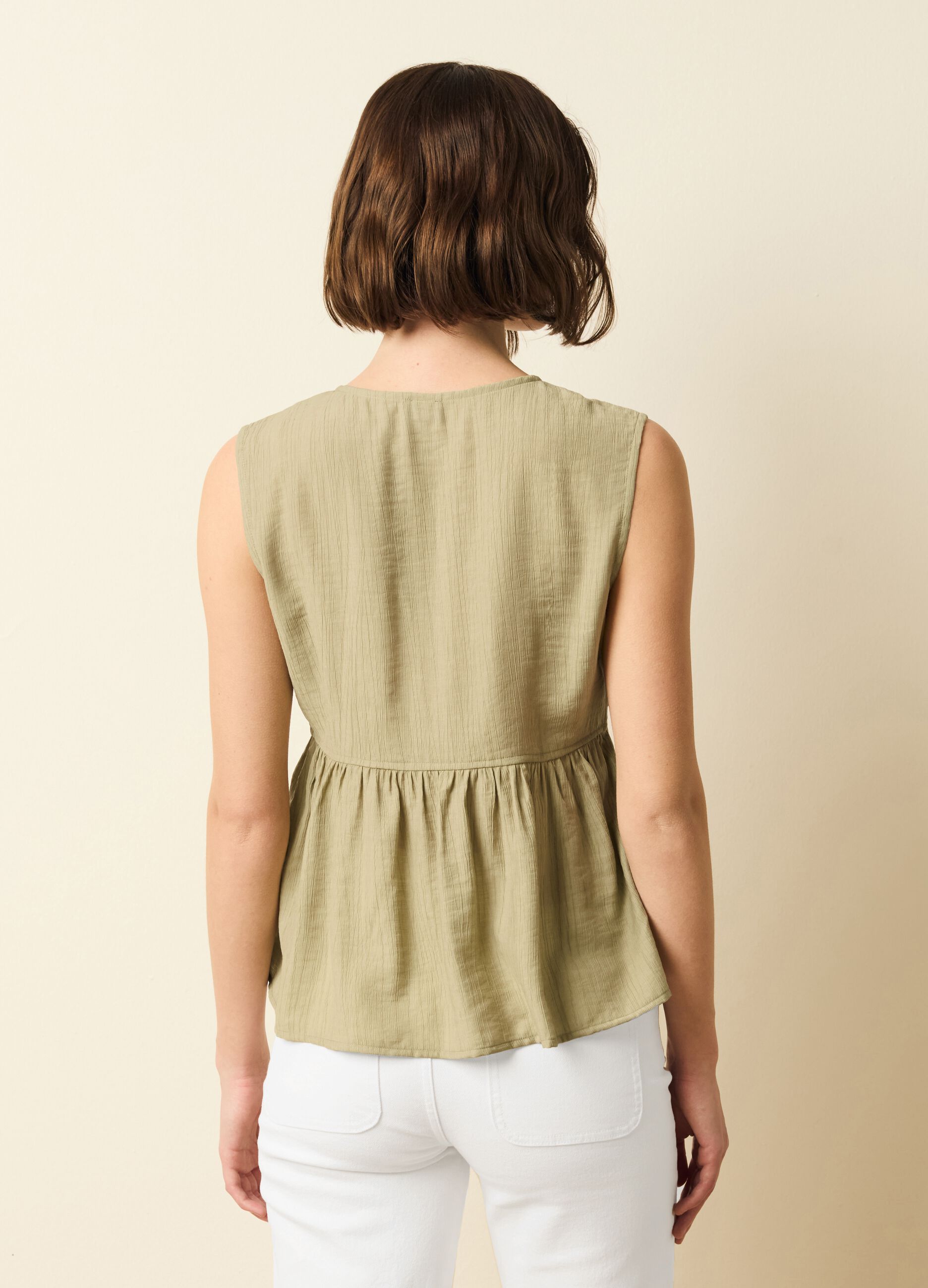 Blusa scollo a V con laccetto