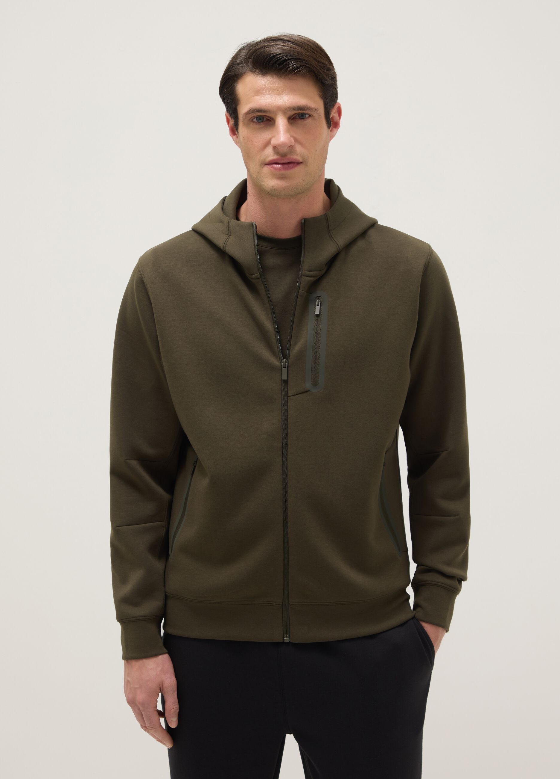 Regular fit green hoodie with front zip collar
