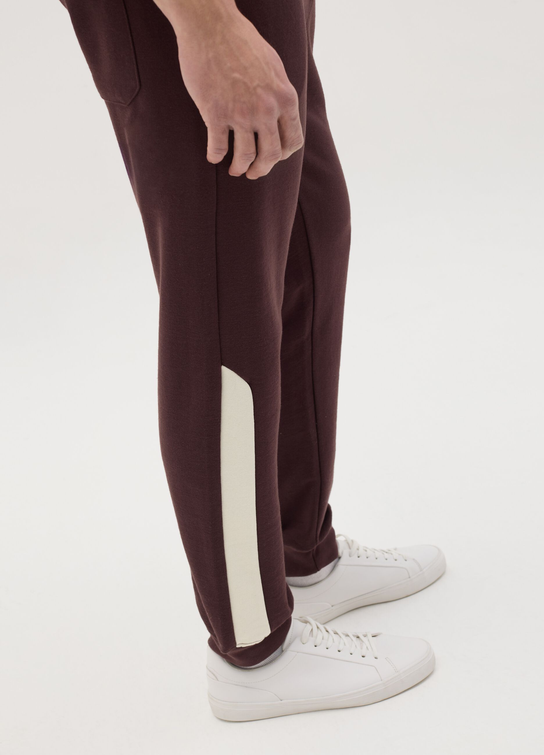 Joggers with contrasting inserts and logo embroidery