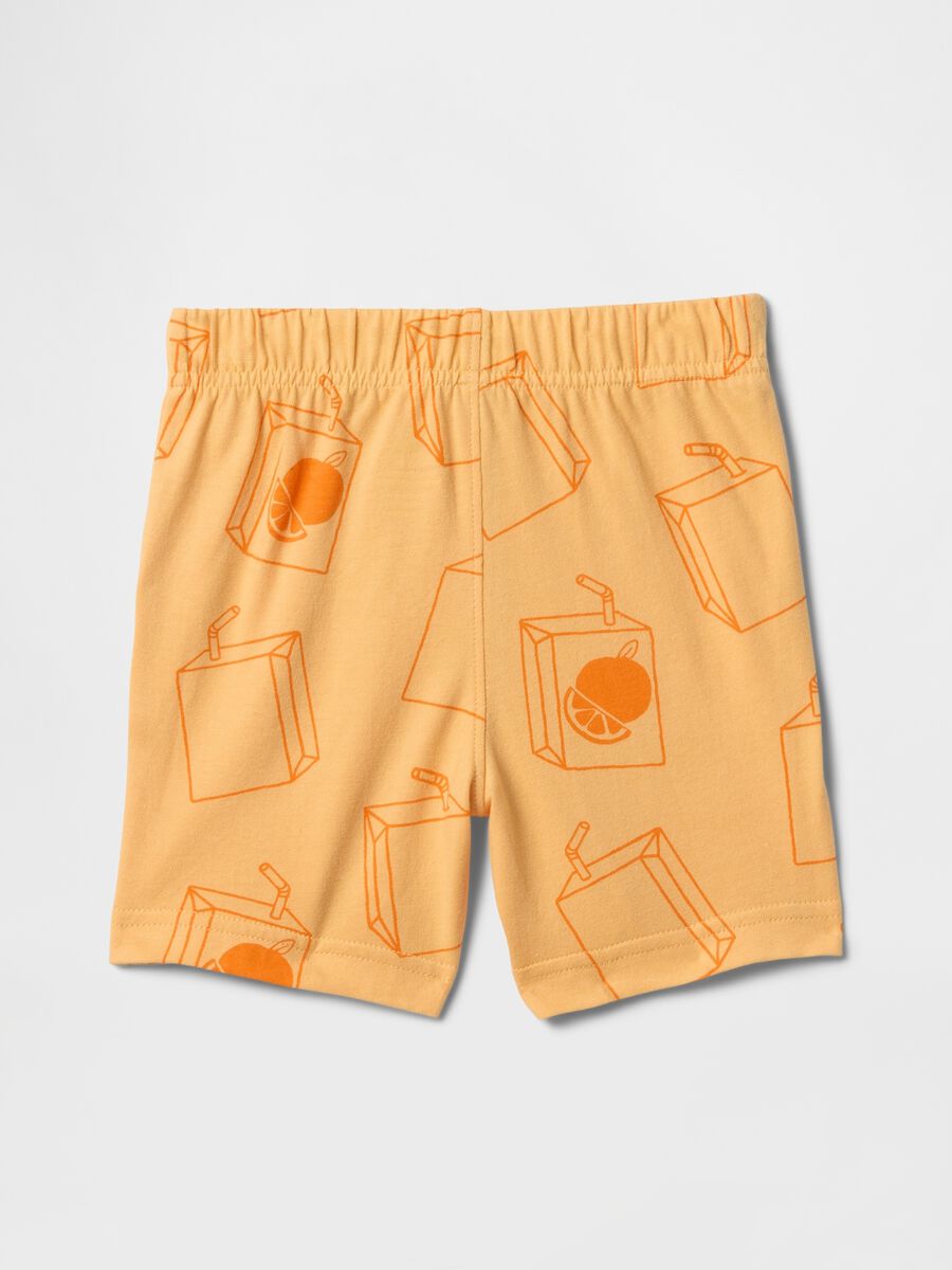 Orange shorts with fruit juice pattern_0