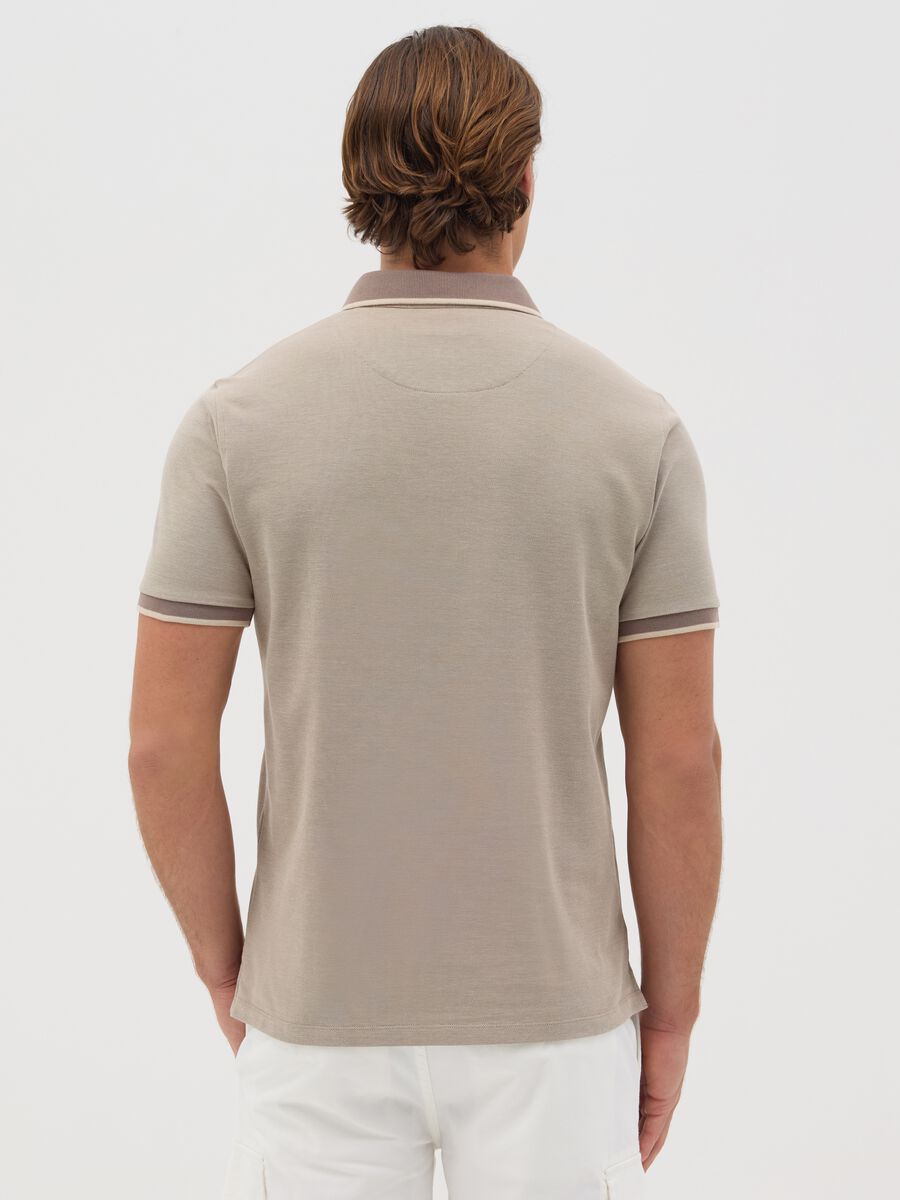 Beige polo shirt with short sleeves in cotton piquet_2