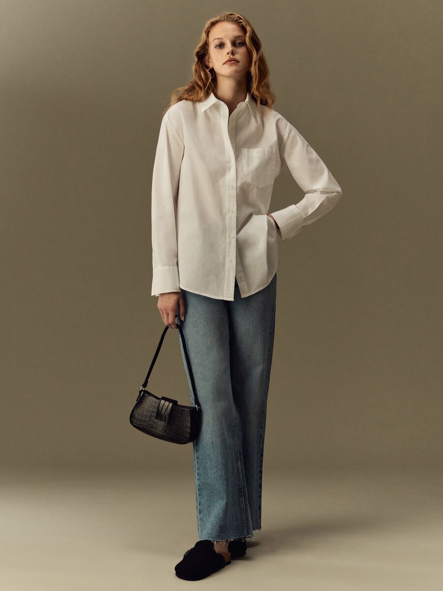 Jeans straight fit con orlo a vivo_0