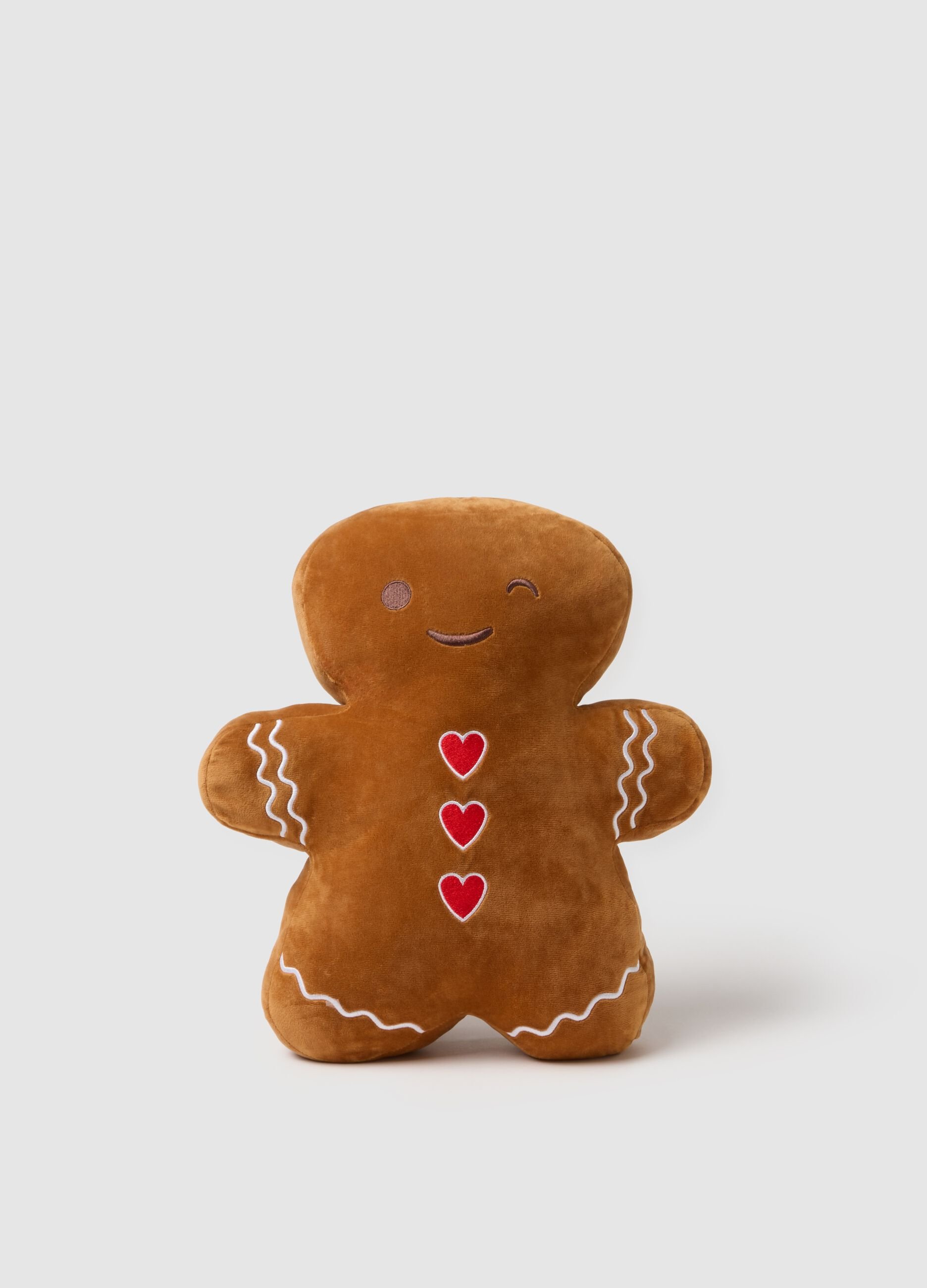 Brown house ornament shaped like a gingerbread