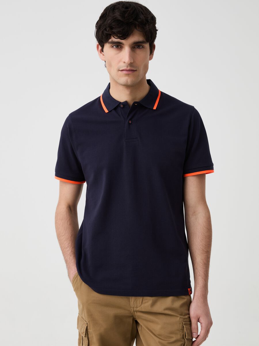 Solid colour polo shirt with fluorescent edging_0