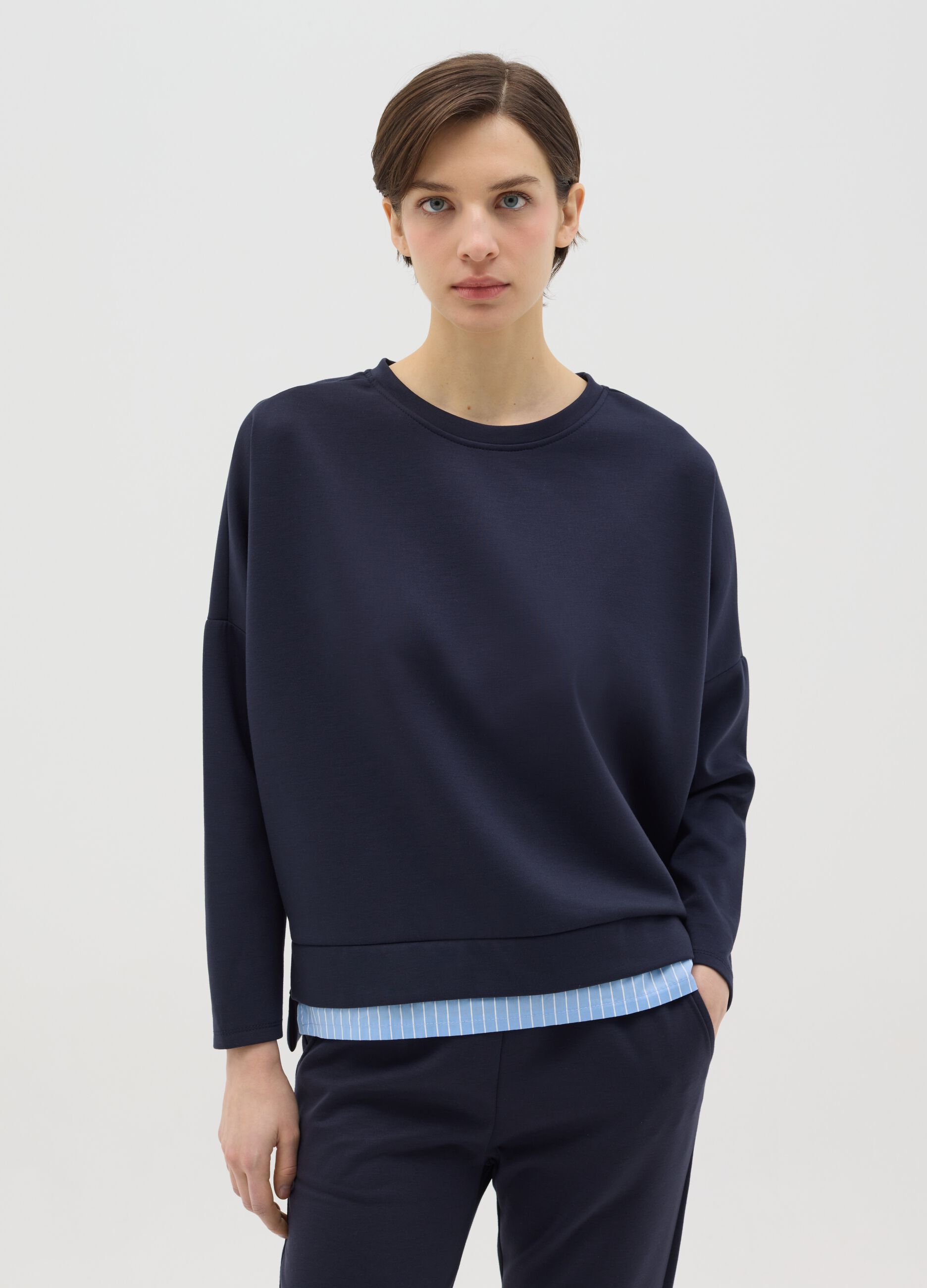 Blue top with layered-effect hem