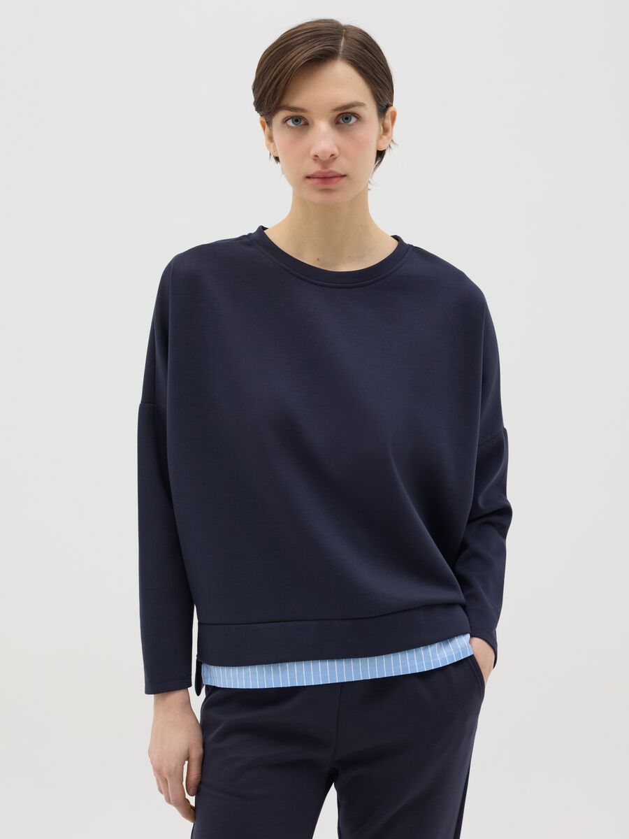 Blue top with layered-effect hem_0