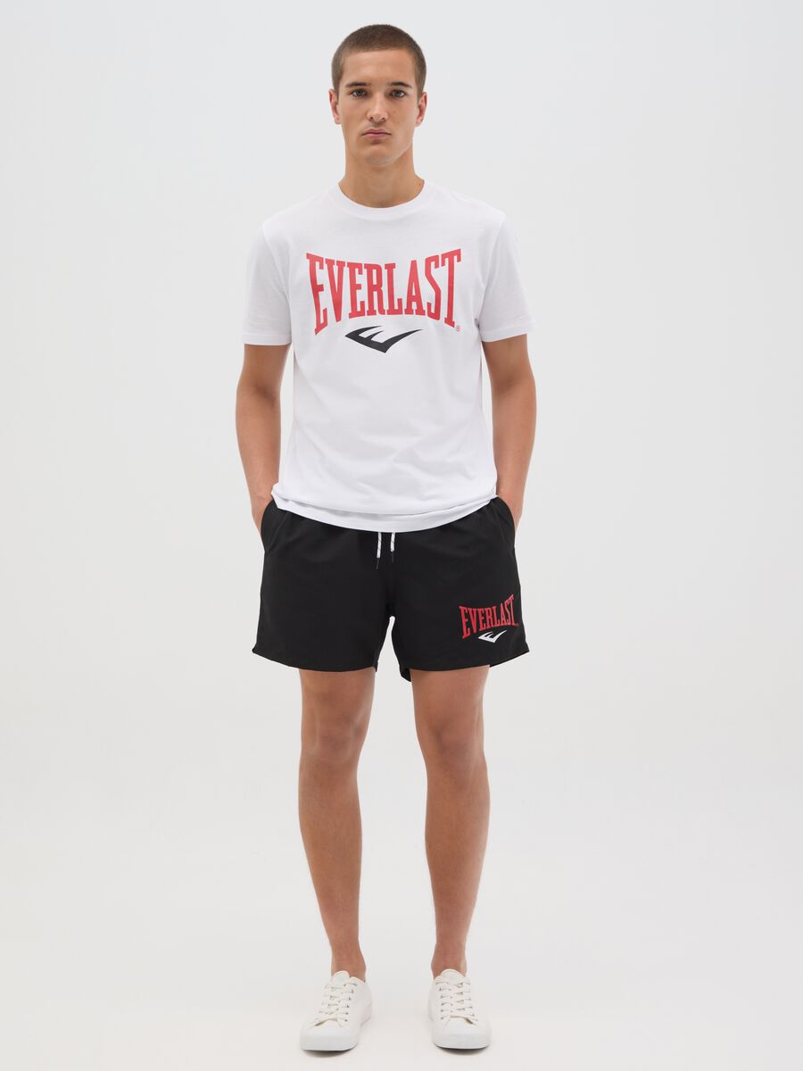 Black swimming trunks with logo print_0