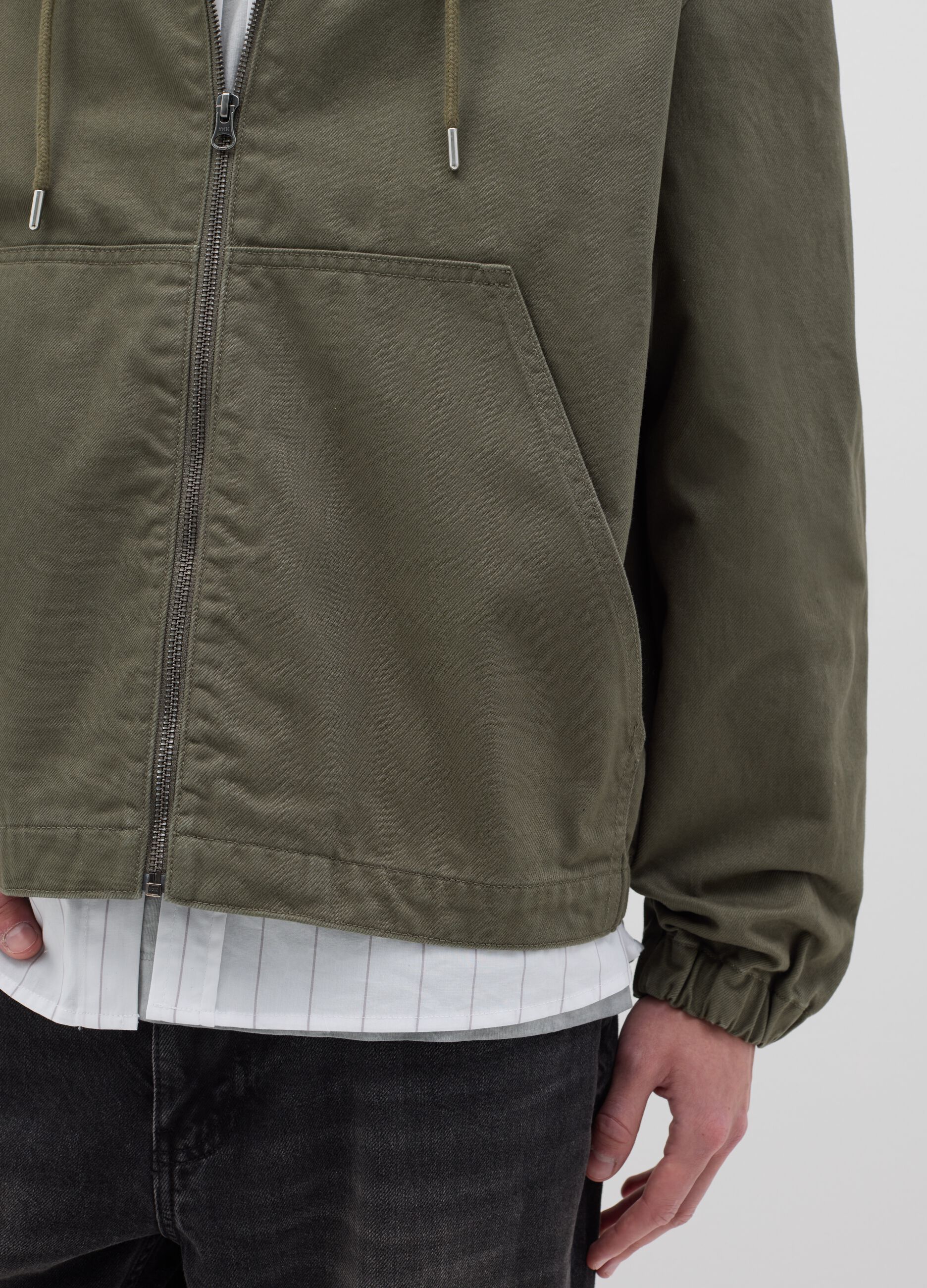 Short green full-zip jacket with hood