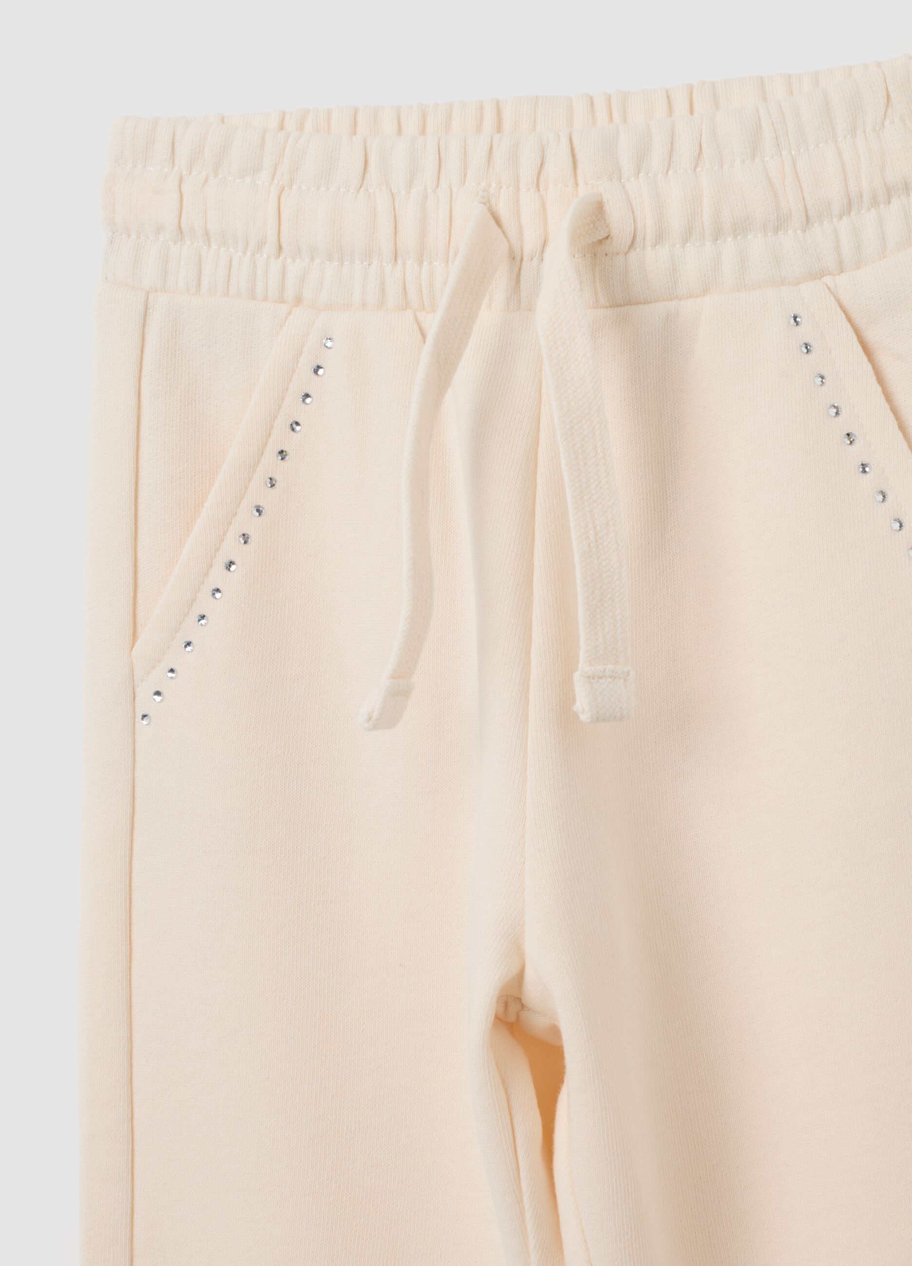 Pantaloni jogger da bambina in puro cotone beige
