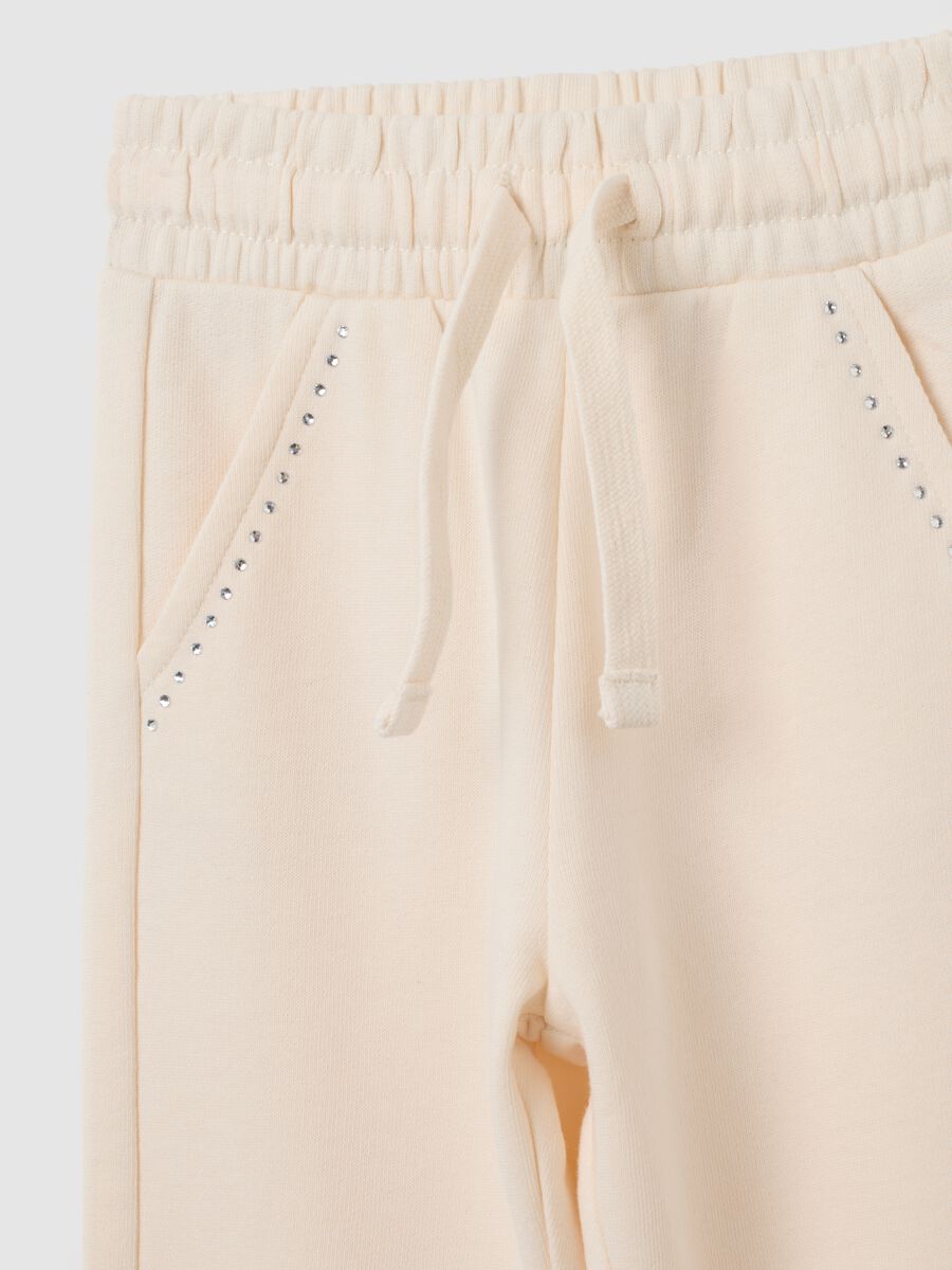 Pantaloni jogger da bambina in puro cotone beige_2