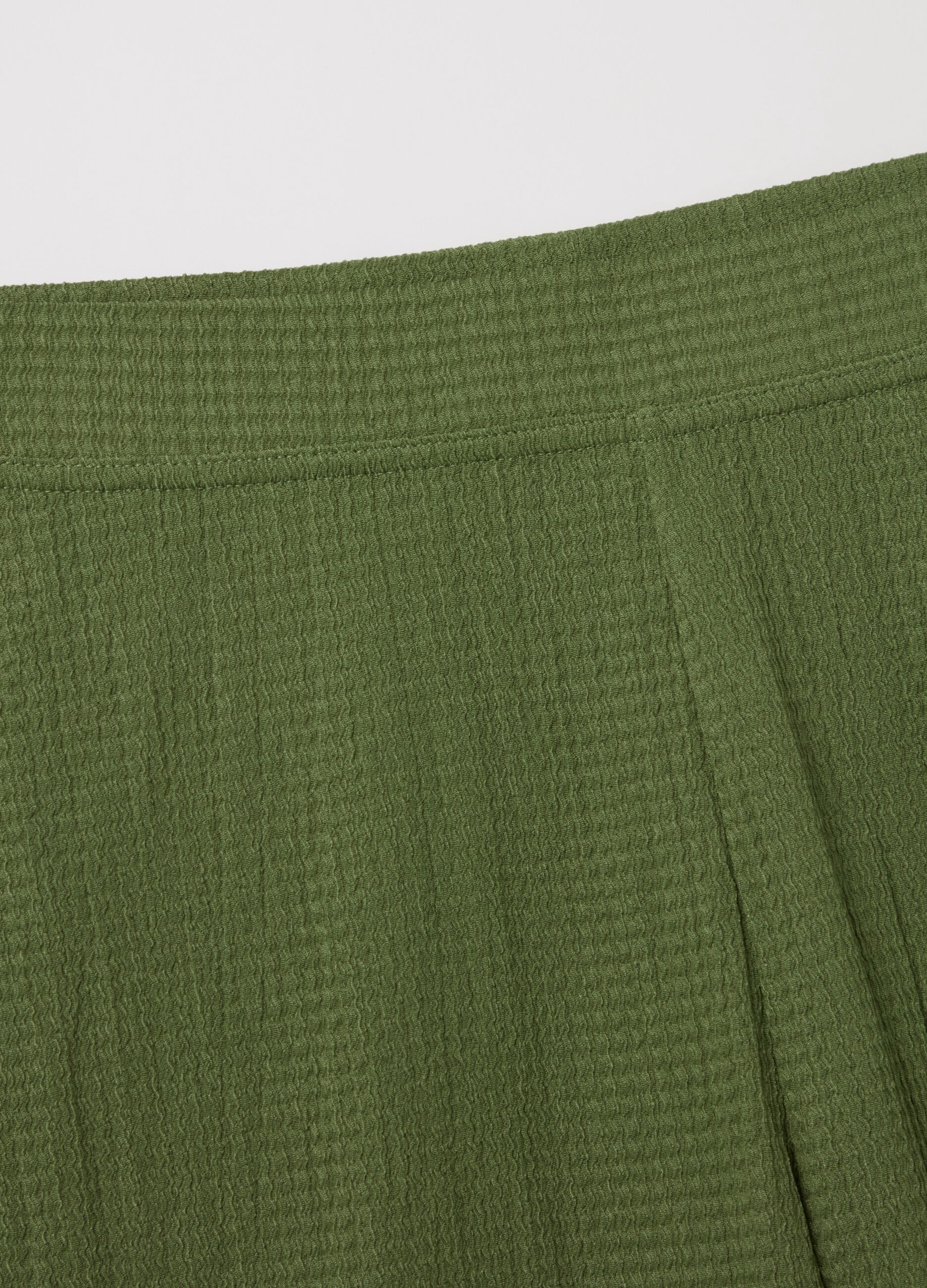 Wide-leg green trousers with waffle weave