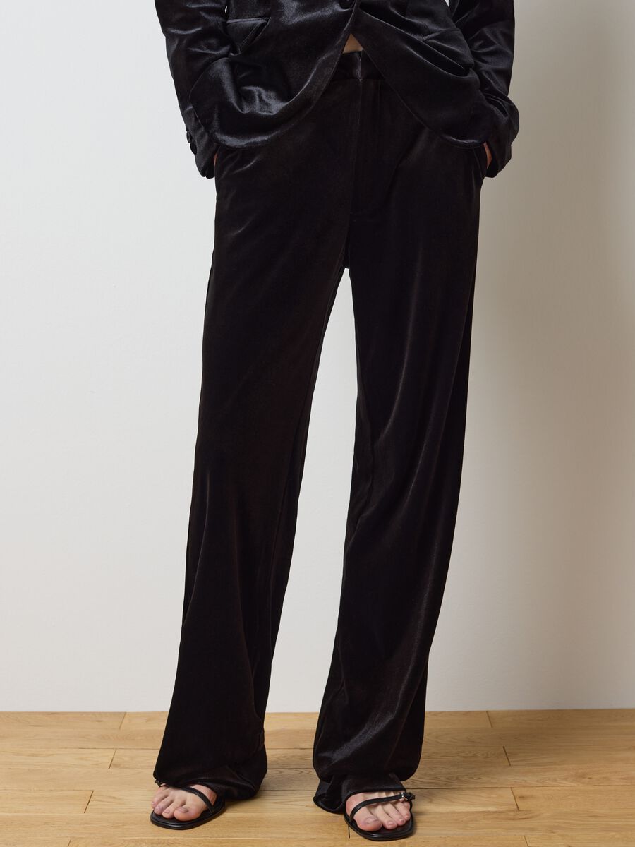 Pantaloni in velluto nero flare fit_1