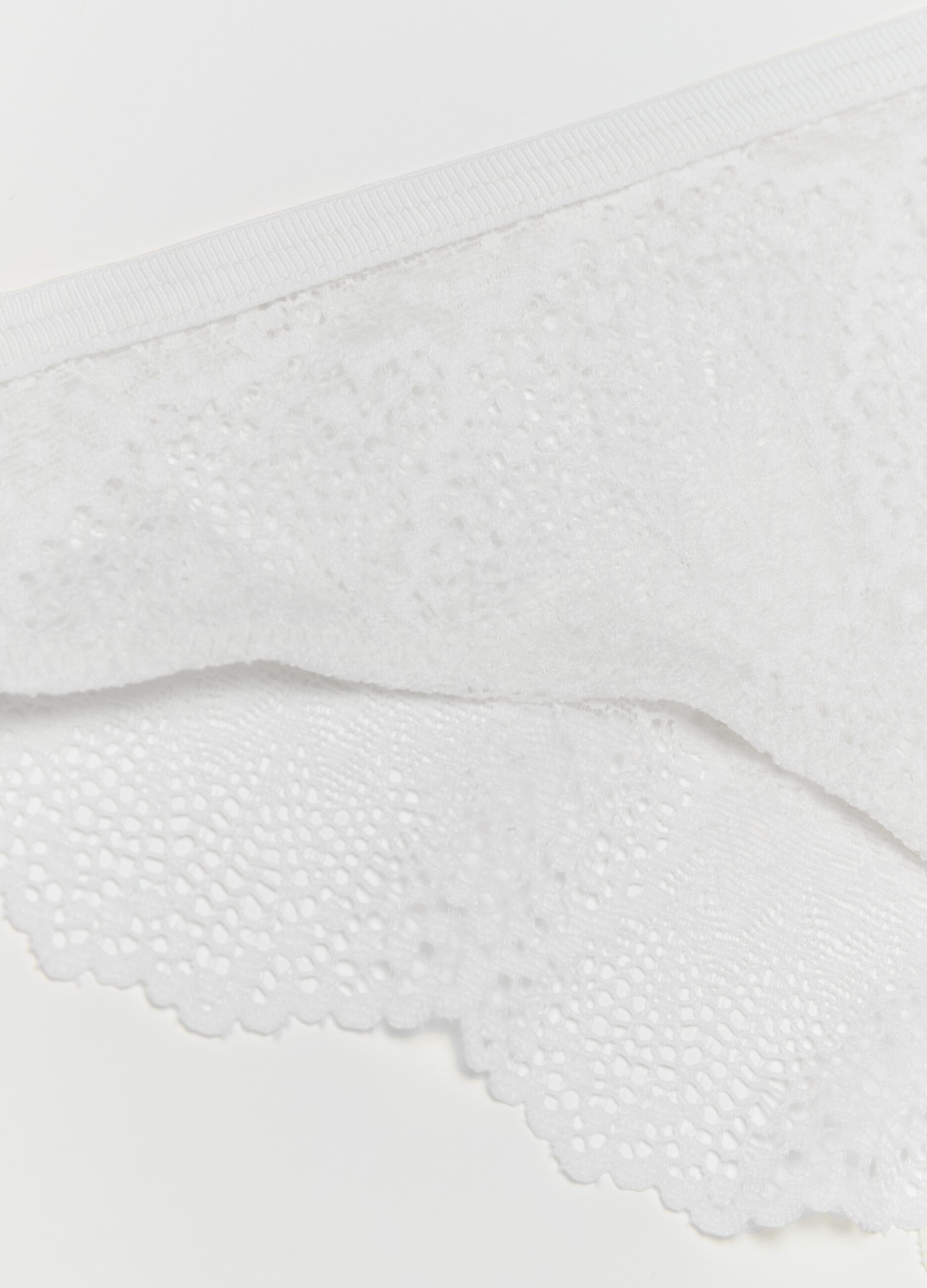 Lace thong with openwork design