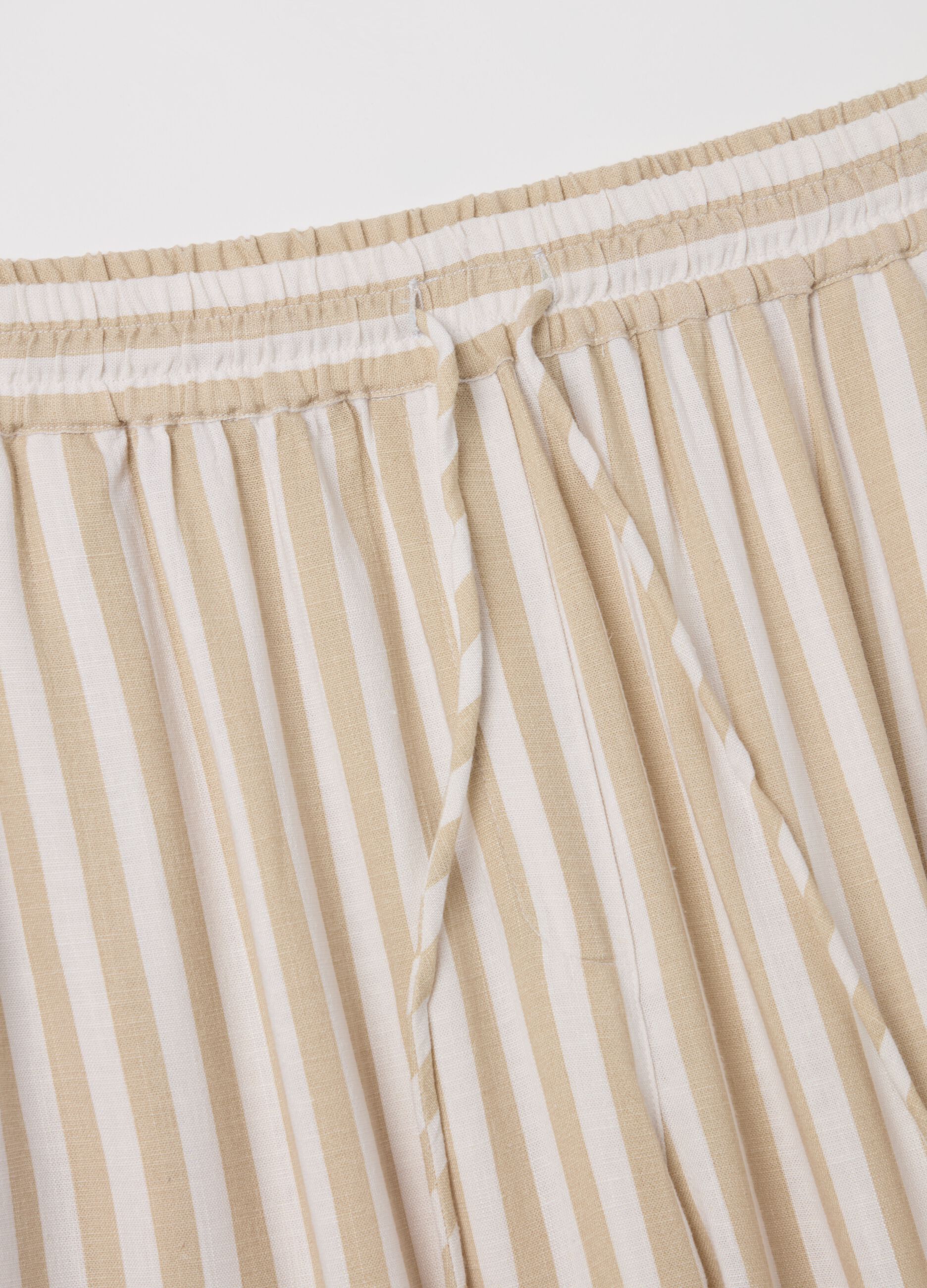 Striped beige palazzo trousers in viscose and linen