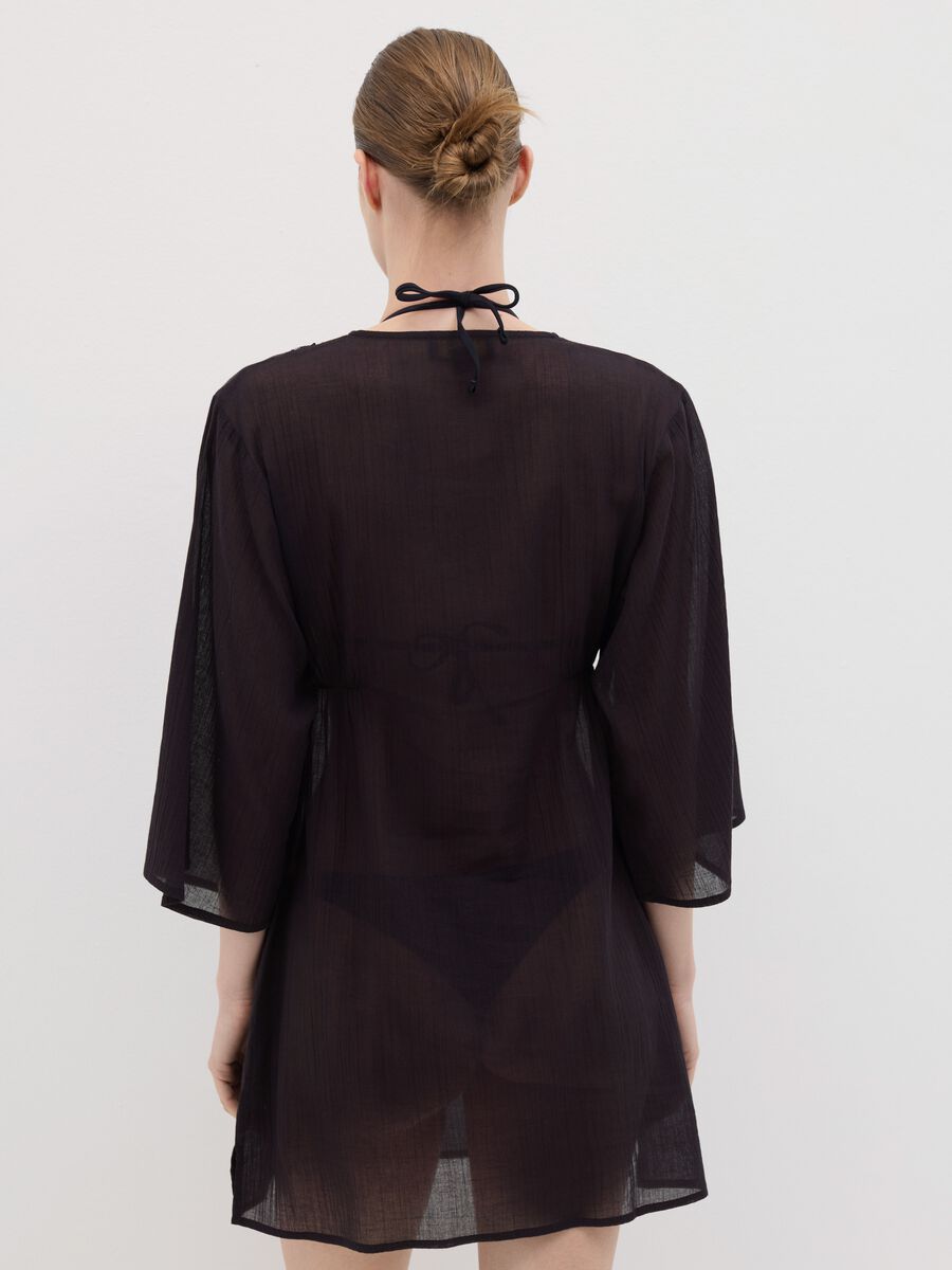 Black beach cover-up with decorative edging_3