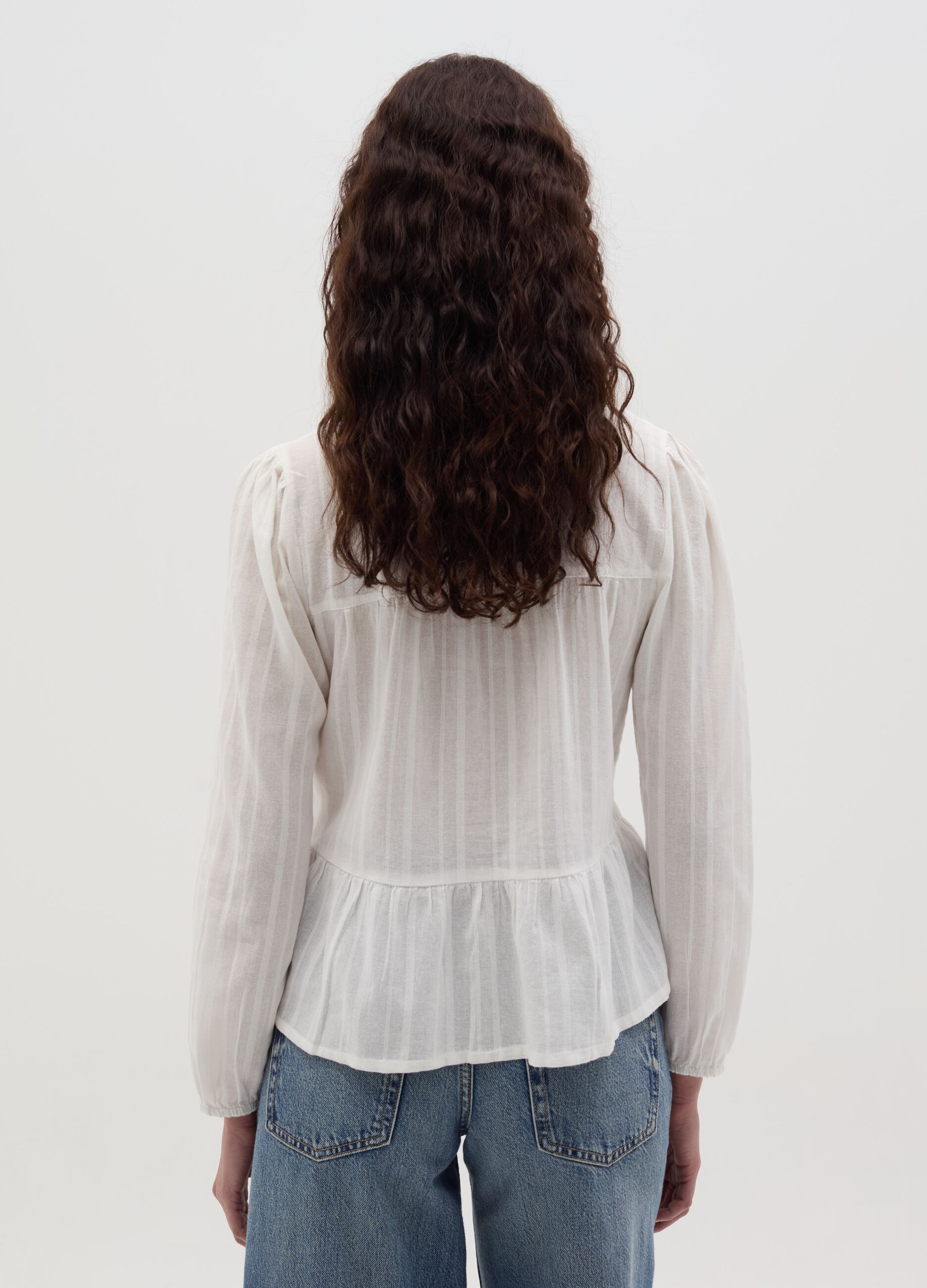 Blouse with laces and striped motif