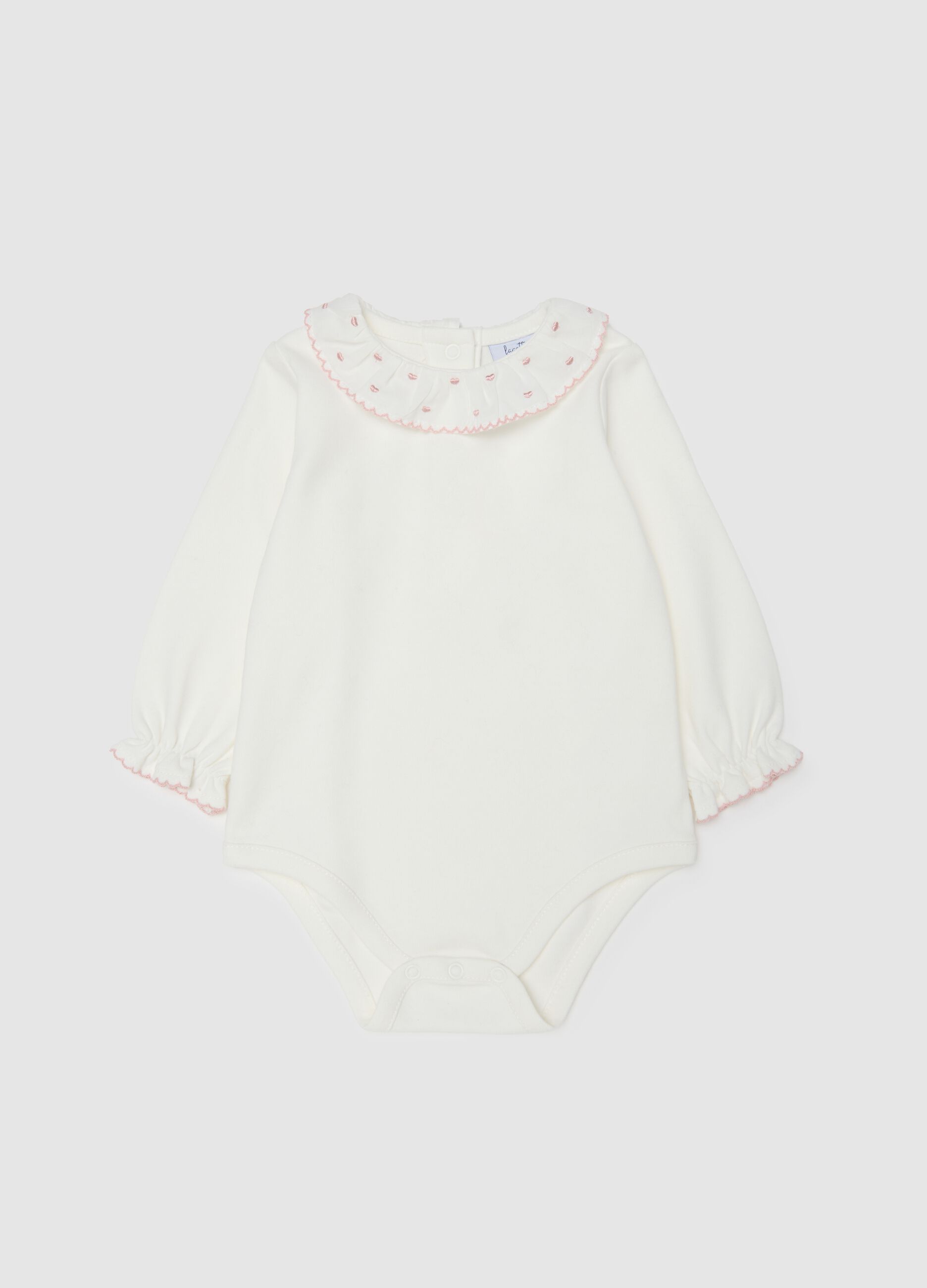 White infant bodysuit in pure cotton with embroidered collar