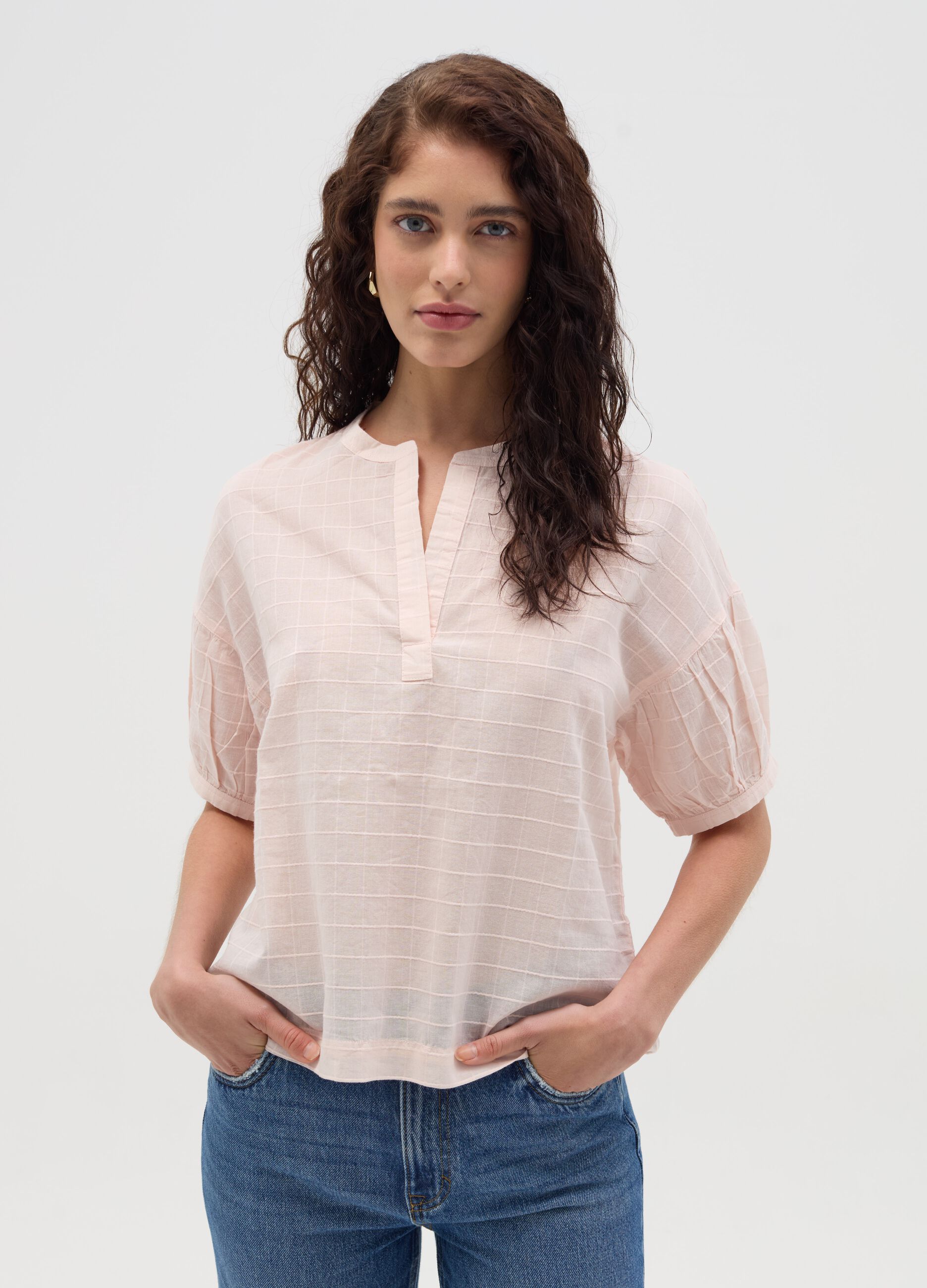 Blusa con cuciture in rilievo
