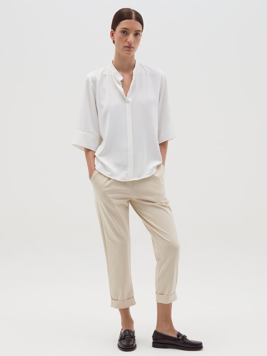 Cropped chino trousers with turn-ups_0