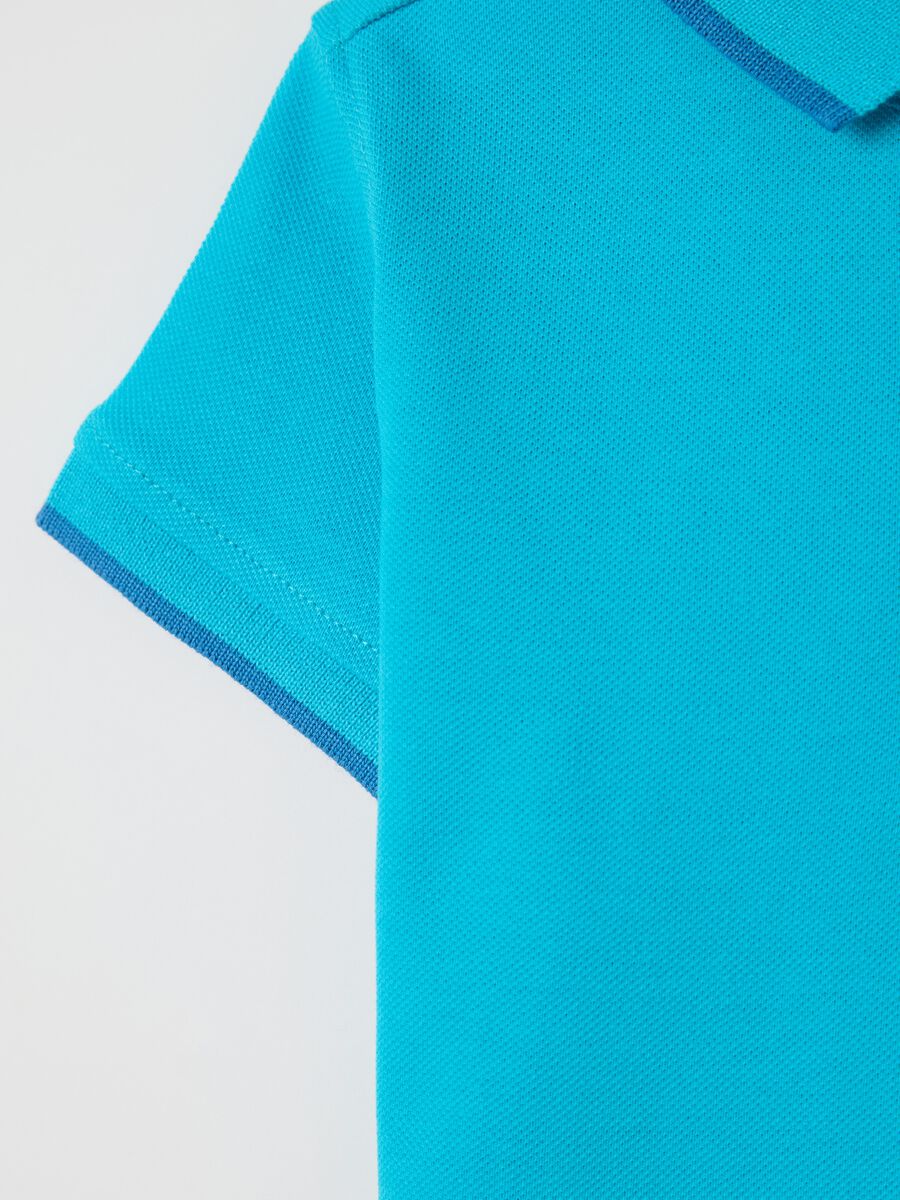 Light blue polo shirt in piquet with hippopotamus surfer_2